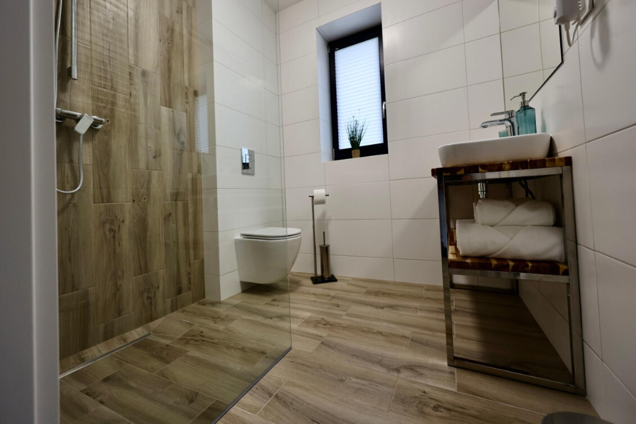 Połowa domu wakacyjnego przy plaży w Stepnicy-Badezimmer