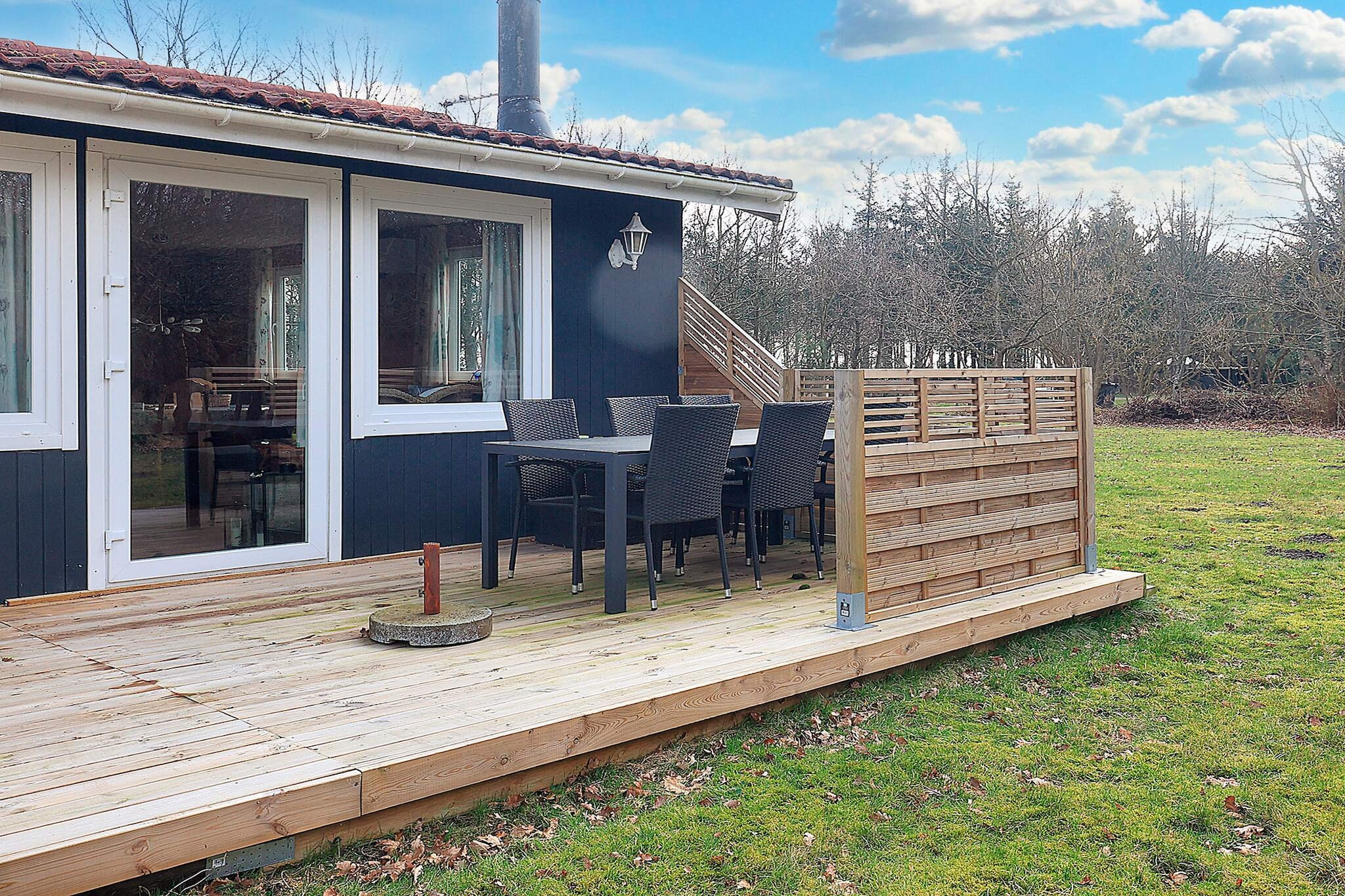 This inviting holiday home is set on a large natural plot in a tranquil area near Gerå, offering the perfect retreat for those seeking peace and relaxation. While the water is just under 1 km away, the house enjoys a prime location in the first row of dunes, giving a sense of seclusion and natural beauty. At first glance, the nearby shoreline appears to be a reed and grass beach, but a stone jetty has been constructed, extending far into the water, with sandy shores on either side—ideal for leisurely walks and paddling.
The property features both east- and west-facing terraces, allowing guests to enjoy the sun at different times of the day. A small, charming “morning†terrace has also been created, perfect for breakfast in the sunshine on clear days. The interior is well-equipped for comfort, including a stylish bathroom with underfloor heating and a television offering Danish and some German channels. Free Wi-Fi is available throughout, enabling guests to stream content from their own accounts.
Surrounded by natural beauty, this home provides a serene escape while still being close enough to explore the local area. Whether you wish to relax on the terrace, stroll along the jetty, or enjoy the quiet charm of the dunes, the property offers a perfect base for a rejuvenating coastal holiday.
Please note: rental to youth groups is not permitted.