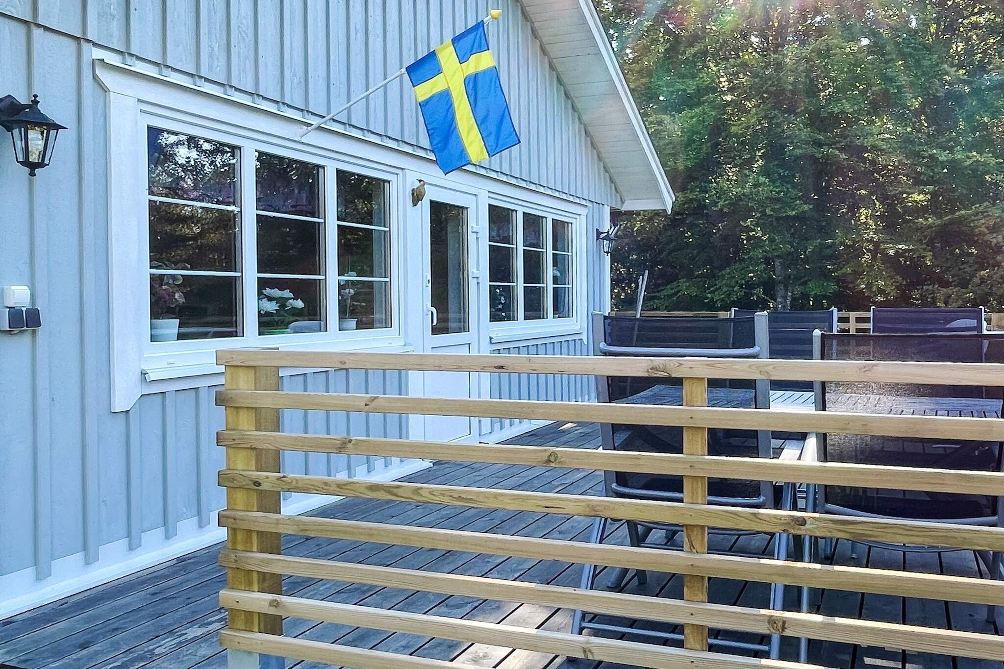 In beautiful forest and lake areas, this brand new house (bulit 2023) is located just a hundred meters from VÃ¥nga lake. Access to the beach below the house and a boat to fish from are included in the rent. The stillness and tranquility here in nature is indescribable and invites lots of fresh air and fellowship with family and friends. The house has a large patio with garden furniture and charcoal grill overlooking the lake. From here, a patio door into the kitchen with an open floor plan and open in the ceiling up to the ridge, which gives a lot of space. There is a dining table and sofa bed in this large family room with a fireplace in the center. A fire can be lit for warmth and provides a high cozy factor during shared moments around the dining table. Wood for the stove is bought from the owner upon arrival or during the stay. The house has two nice bedrooms with a double bed in each room. The bathroom with entrance from the hall next to the bedrooms is bright and fresh, and also has a washing machine. As the house is nestled in beautiful nature with lots of deciduous forests and lakes in the area, there is a lot to see and experience around the knot. For those interested in fishing, HarsjÃ¶mÃ¥la forest and sport fishing area is nearby, as is Halens FriluftsomrÃ¥de with canoe and kayak rental, which is a larger nature reserve right next to OlofstrÃ¶m. In Karlshamn there is &quot;Kreativum&quot;, which is a discovery center for curious people of all ages. Even Eriksberg Wildlife and Nature Park, east of Karlshamn, offers animals and nature enthusiasts fantastic experiences in the safari park. There are many islands to discover through day trips with the archipelago traffic in Blekinge, for example TÃ¤rnÃ¶, HanÃ¶ and TjÃ¤rÃ¶. Welcome to discover Blekinge!