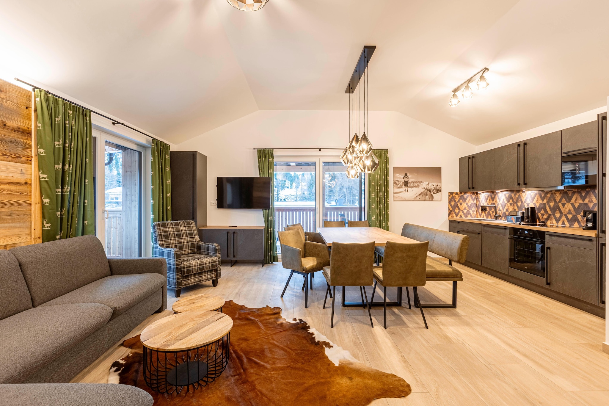 Discover the charm and comfort of our cozy alpine apartment, perfectly designed to accommodate up to 8 guests across its well-appointed 73 mÂ². Nestled in a picturesque pine forest at approximately 1,800 metres above sea level, this inviting retreat offers a delightful blend of modern amenities and natural beauty. The apartment features three inviting bedrooms: two with comfortable double beds and one with two bunk beds, ideal for families or groups. For added convenience, there are two bathrooms with refreshing showers. Step outside to your private terrace, where you can uenjoy the stunning mountain views. 

 This apartment is in the serene pine forest for a range of outdoor activities. In winter, youâ€™ll have access to nearby ski slopes and trails, while summer invites you to explore hiking paths, mountain biking routes, and the breathtaking natural surroundings. Your stay also includes the exclusive Butler Card or Butler Programme, adding an extra touch of personalized service to your alpine getaway. 

The open-plan kitchen is a culinary delight, fully equipped with everything you need for preparing meals. It includes cutlery, cookware, a ceramic hob, oven, dishwasher, and a fridge with a freezer compartment. Additional amenities such as a toaster, kettle, and coffee machine ensure you have all the essentials. A small starter set with dishwasher tabs, dishwashing liquid, a sponge, garbage bags, cleaning supplies, and a tea towel will be provided upon your arrival for a smooth start to your stay. 

Stay connected with free Wi-Fi and enjoy a variety of channels on satellite TV .