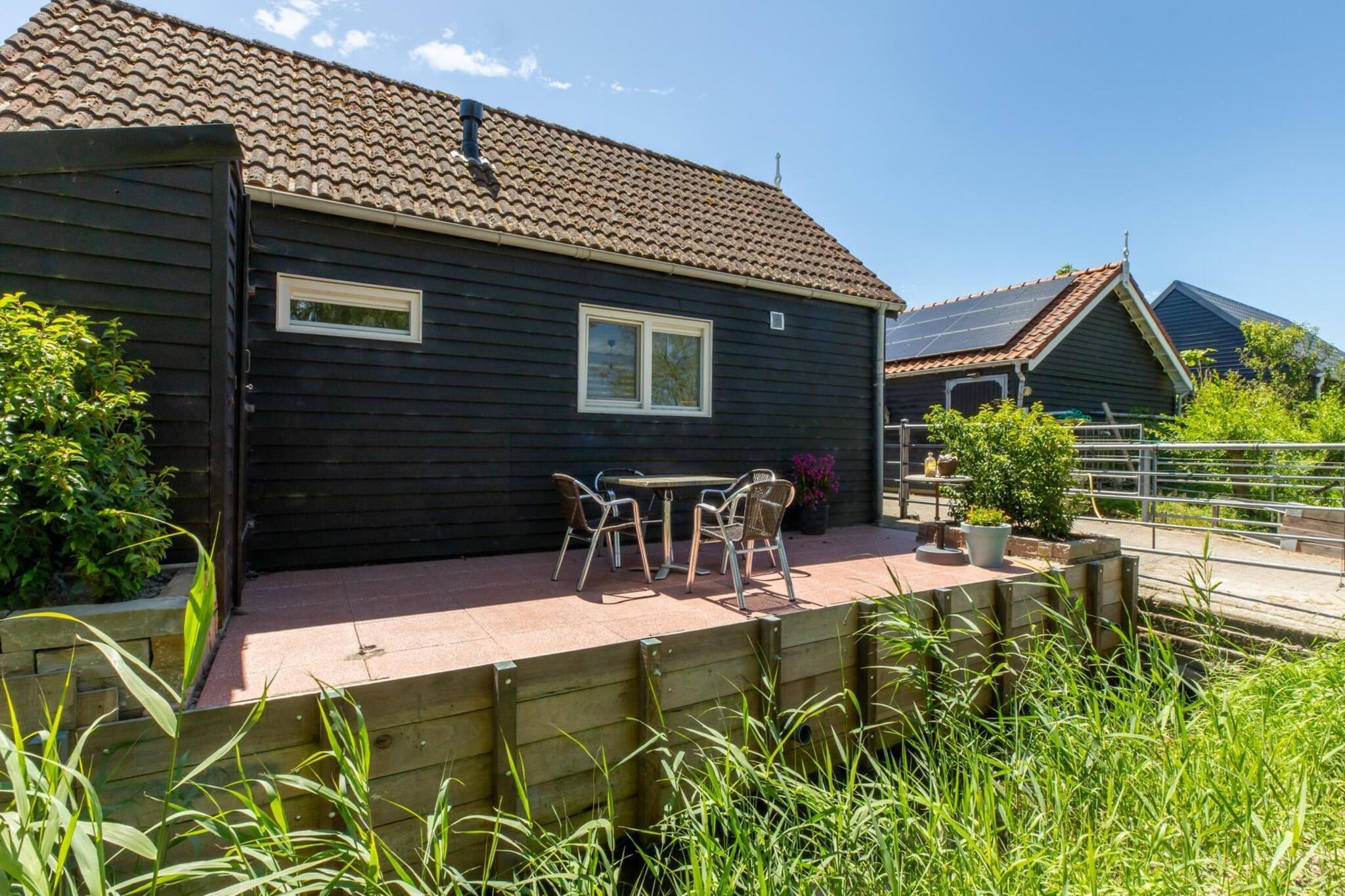 Achterweg 10 l Zonnemaire 'Sol e Mar' - Buitenkant zomer