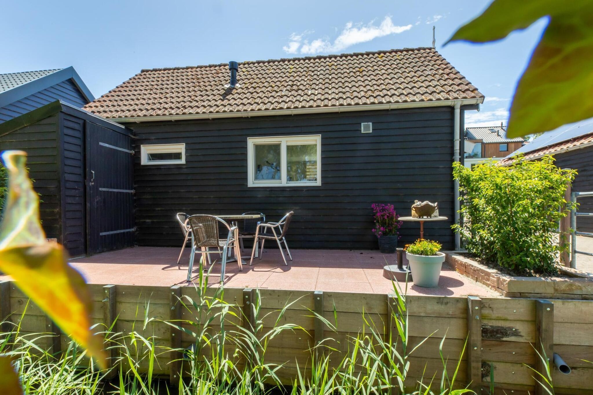 Achterweg 10 l Zonnemaire 'Sol e Mar' - Buitenkant zomer