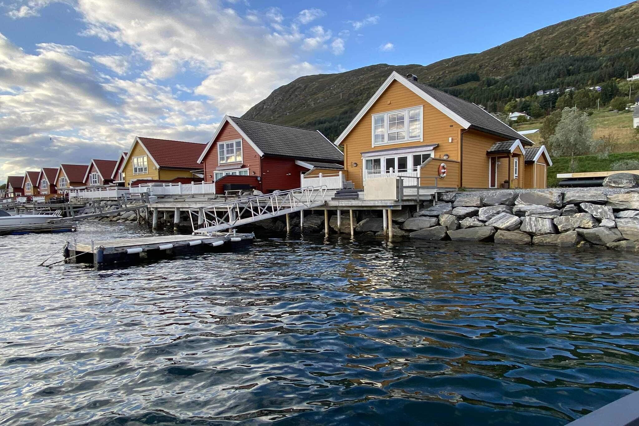 Internet Access DSL, open kitchen(cooker(electric), hood, coffee machine(filter), waffle iron, microwave, dishwasher, fridge, freezer(200-249L), washing machine, high chair), Living/bed room(26 m2)(TV(satellite, german television channels, norvegian TV channels )), bedroom(double bed, cot), bedroom(2x single bed), bedroom(2x single bed), bathroom(floor heating)(washbasin, shower, toilet), bathroom(floor heating)(bathtub or shower, washbasin, toilet), heating(electric), terrace(22 m2), garden furniture, BBQ, parking