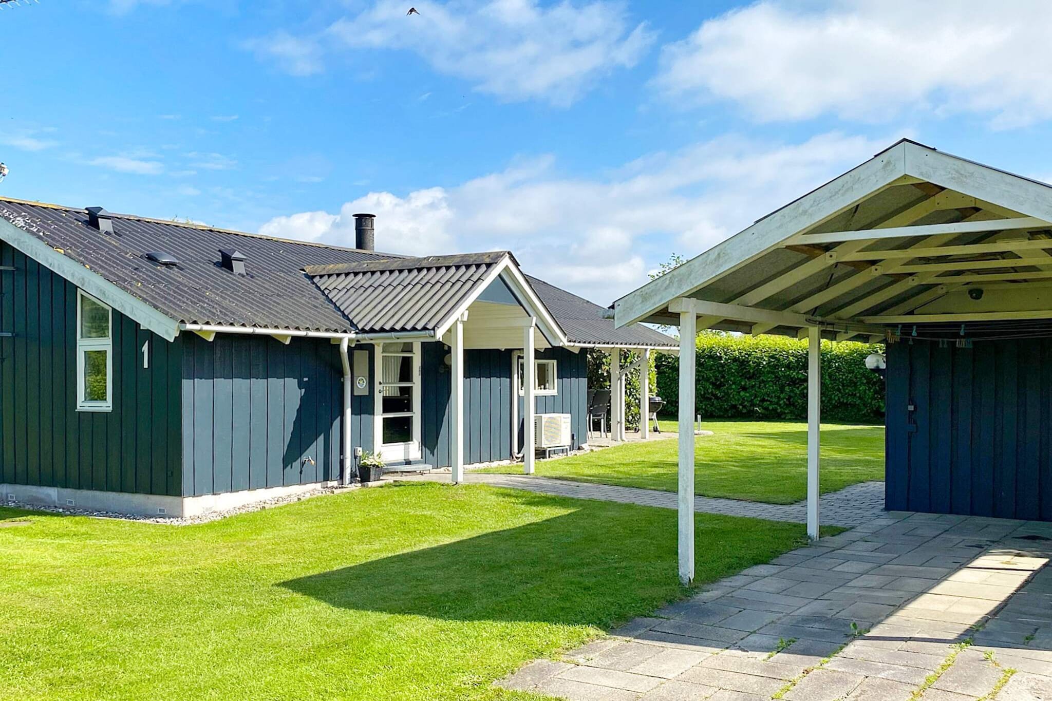 Modern and inviting vacation home only about 350 m from the lovely beach at KÃ¸bingsmark. The vacation home is 64 mÂ² and was built in 1992. In 2016, it underwent a partial renovation and is equipped with an energy-saving heat pump. The house is built with good materials and is energy efficient.


The bright living room is open to the dining area and the bright kitchen. The style of the house is consistently light and friendly.

The kitchen is equipped with a refrigerator, ceramic hob, convection oven, microwave, and dishwasher. In addition, there is an 80-liter freezer, washing machine, and wood-burning stove.

There are a total of three bedrooms with two double beds and one single bed. Bathroom with shower.

For entertainment, you will find a TV with Chromecast, Blu-ray player, DVD player, radio, CD player, and PlayStation 3. Wireless internet is available.

The house has a cozy terrace where you can relax and enjoy the view of the grounds. There is a 10 mÂ² open terrace and a 6 mÂ² covered terrace. There is a tool shed and barbecue.

The house is located on a 656 mÂ² garden plot with a trampoline (use at your own risk/insurance). It is approx. 350 m to the sea.  From the cottage, it is approx. 3 km to Nordborg town, where you will find a large shopping center and various restaurants. Not available for rental to youth groups.