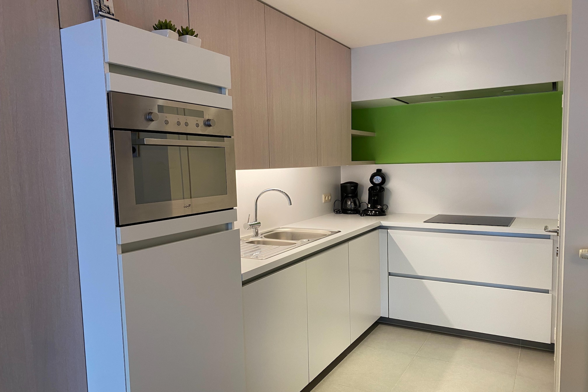 Discover the perfect coastal getaway in Nieuwpoort-Bad! This stylish two-bedroom apartment, nestled in the bustling shopping street, offers a harmonious blend of comfort, convenience, and modern amenities. Just steps from the golden sands and azure waters of Nieuwpoort Beach, itâ€™s an idyllic retreat for relaxation and recreation. Admire breathtaking sea views from your living space, unwind with Wi-Fi-enabled entertainment, and prepare delightful meals in the fully equipped kitchen. The cozy bedrooms promise restful nights, while secure underground parking and a convenient lift ensure a hassle-free stay. Nieuwpoortâ€™s charm extends beyond the beach â€“ explore the vibrant marina with its colorful sailboats, savor waterfront dining, or venture into the scenic countryside on well-marked trails through picturesque villages and lush farmland. Whether youâ€™re soaking up the sun or exploring historical landmarks, this apartment is your gateway to unforgettable moments in Nieuwpoort-Bad.
