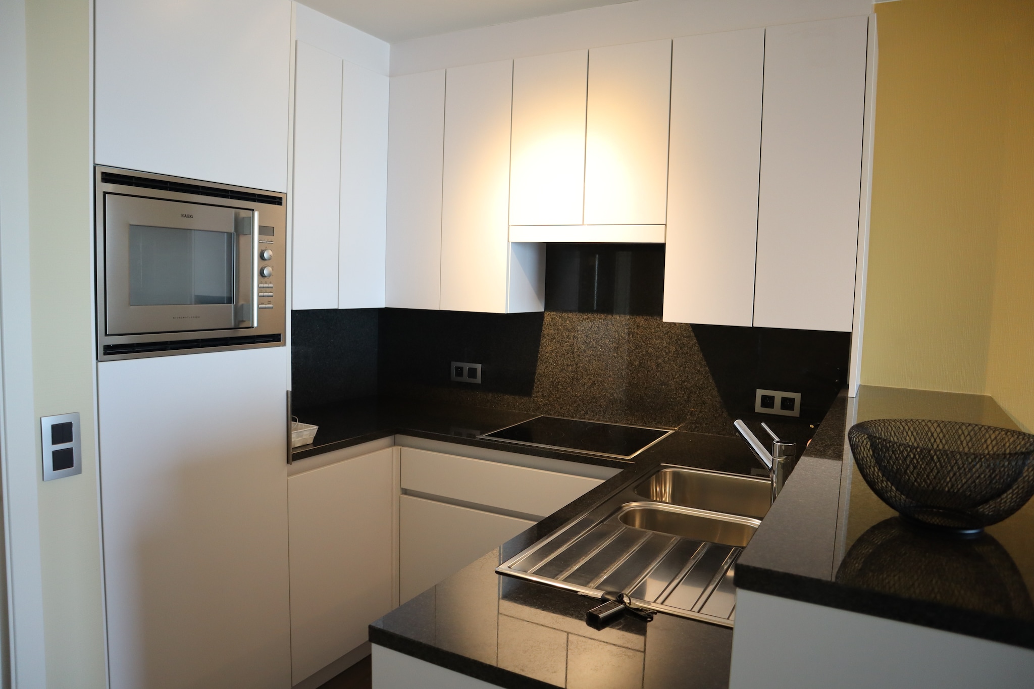 Wake up to the sound of the waves in this bright and welcoming two-bedroom apartment located directly on the Nieuwpoort sea wall. Perched on the 5th floor, it offers stunning views of the North Sea and a warm, coastal ambiance perfect for families or couples. Inside, youâ€™ll find a comfortable living area, a fully equipped open kitchen, and restful bedroomsâ€”including one with an en-suite and a cozy bunk bed setup ideal for kids. Enjoy your morning coffee or sunset aperitif on the spacious terrace overlooking the beach.

Step outside and you're right on the promenadeâ€”moments away from the sandy beach, boutique shops, and delightful seaside cafÃ©s. Nieuwpoortâ€™s picturesque marina is just 3 km away, perfect for a scenic stroll or boat-watching over lunch. Adventurers can cycle through serene landscapes or visit nearby gems like the Ter Hille Golf Course (5 km) and Plopsaland De Panne (20 km) for a family day out.

Enjoy home-like amenities with modern appliances, a dishwasher, digital TV, and lift access for hassle-free arrivals. The garage and shared bicycle storage offer added convenience, while the apartmentâ€™s peaceful atmosphere ensures restful nights. Please note: pets are not allowed, making this a perfect choice for guests seeking a calm, allergen-free coastal retreat.