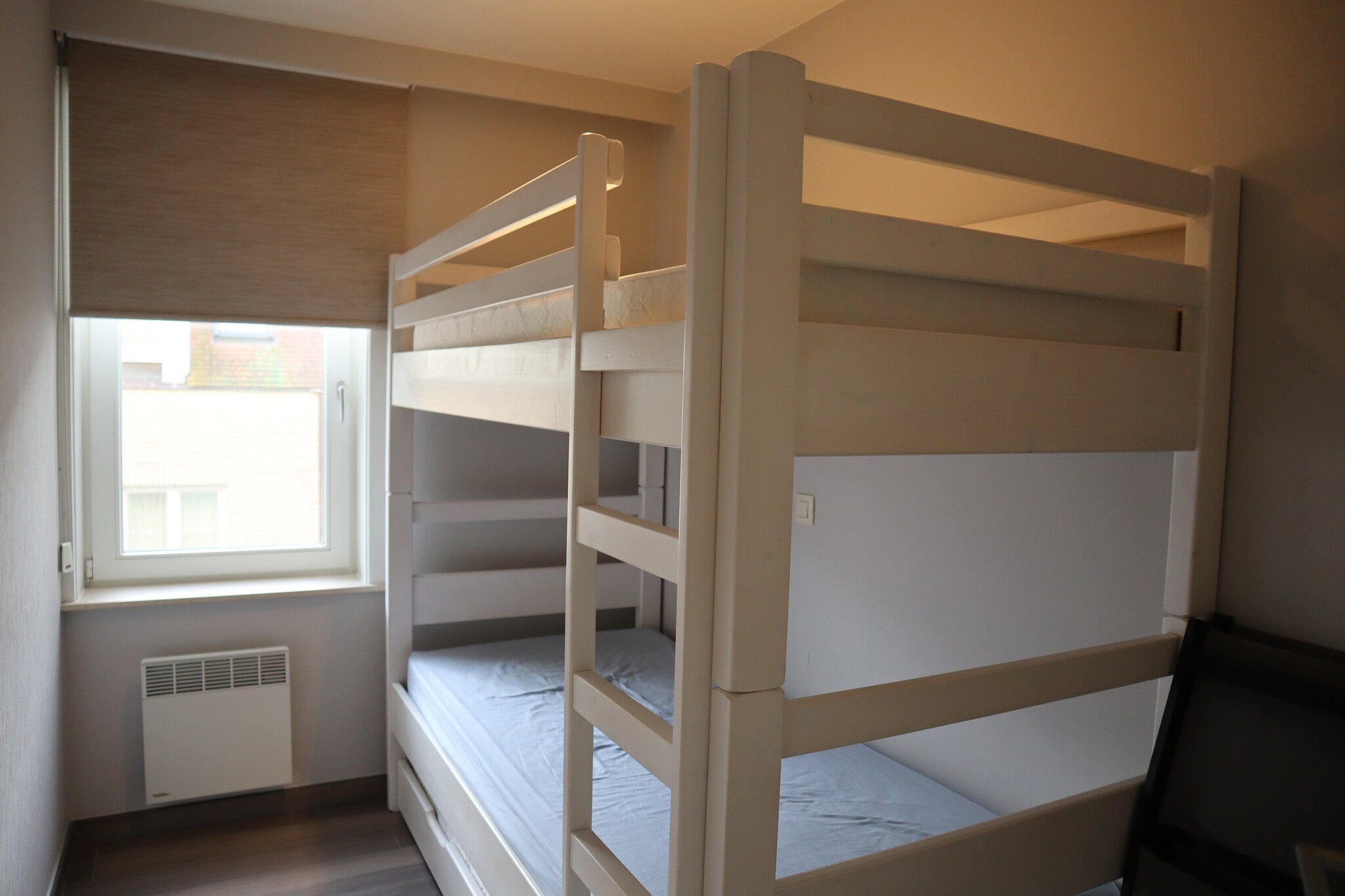 On the 5th floor: (open kitchen(cooker(electric), coffee machine, combination microwave, dishwasher, fridge(+ freezer)), Living/diningroom(TV(digital), dining table, seating area, balcony or terrace), bedroom(bunk bed(duvet, down)), Bedroom with bathroom(double bed(twin duvet , down), shower, washbasin), bathroom(bath tub, washbasin), toilet(toilet), storage)\n\ngarage(on the same premises), terrace, bicycle storage(shared with other guests), garden furniture, lift