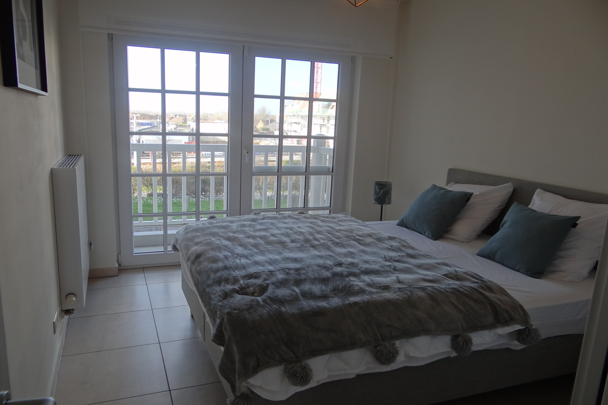 On the 1st floor: (open kitchen(hob(electric), hood, coffee machine(filter, pads), combination microwave, dishwasher, fridge(+ freezer)), Living/diningroom(TV(digital), dining table, seating area, balcony), bedroom(double bed(twin duvet, 180 x 200 cm)), bedroom(double bed(two single duvets, 160 x 200 cm), balcony), bathroom(shower, washbasin), bathroom(bath tub, washbasin, washbasin, toilet), storage(tumble dryer, washing machine, ironing board, iron))\n\ngarage, tumble dryer, bicycle storage, lift