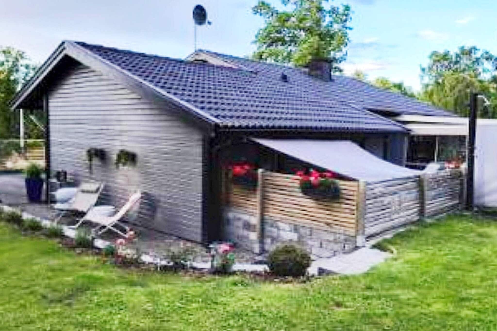 6 Personen Ferienhaus in HÄLLEKIS - Im Freien