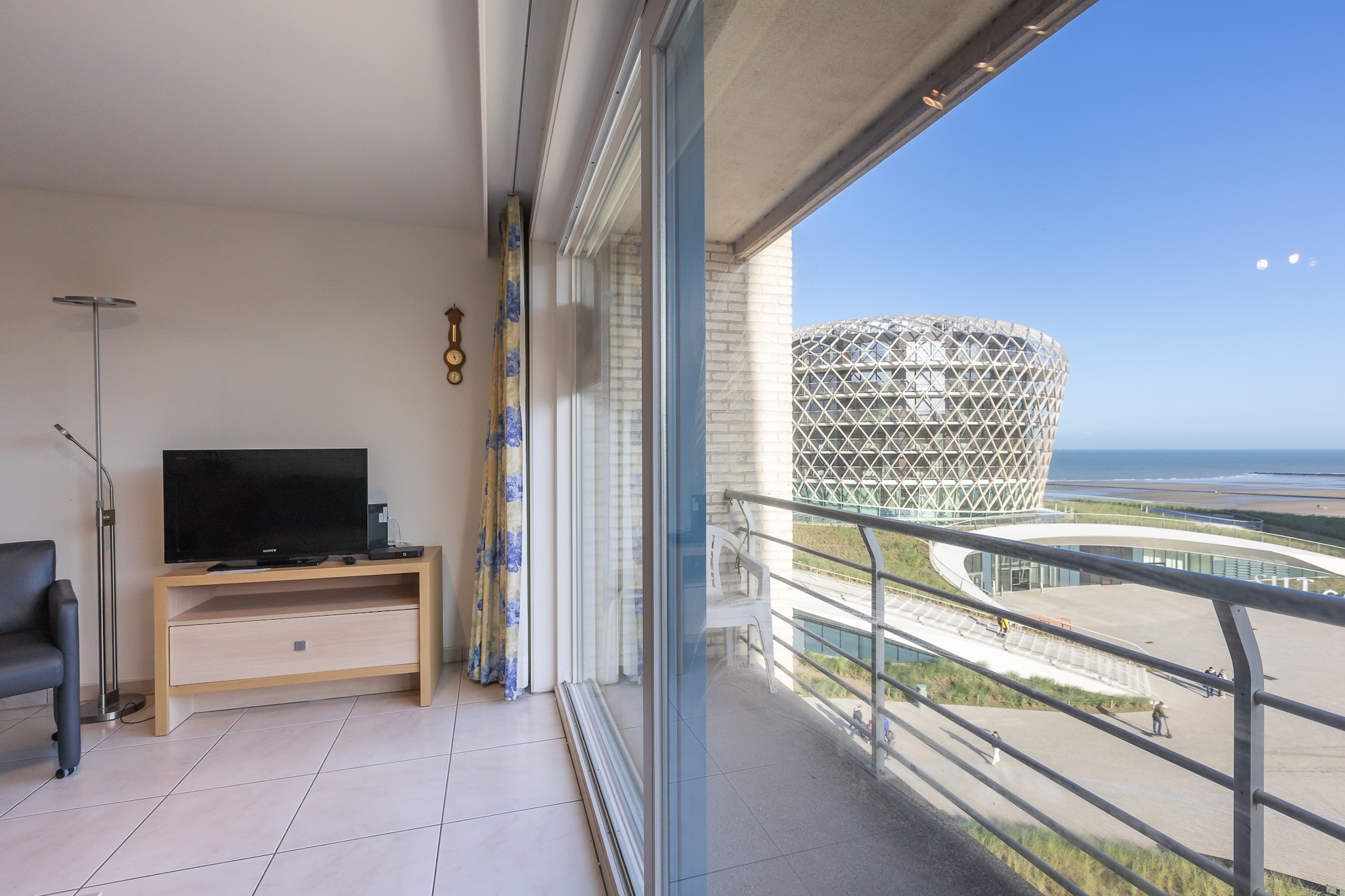This beautiful apartment on the 5th floor is the perfect base for a seaside holiday. It features one bedroom with a double bed and a movable bed on wheels, and a sofa bed for two people, ideal for families or small groups.  The bright living area offers a cozy seating area with sea view, a fully equipped open kitchen, and a dining table for enjoying meals together.  The bathroom includes a double sink and bathtub, and there is a separate toilet for extra convenience.  The apartment boasts a phenomenal view of the new Casino and is located in the heart of Middelkerke, with the tram stop, shopping streets, and restaurants all within walking distance.  A perfect place to relax, enjoy the sea and sun, and experience the vibrant life of Middelkerke!&nbsp;  Wifi: yes - parking: not included - sheets: bring your own - towels: bring your own.  &nbsp;