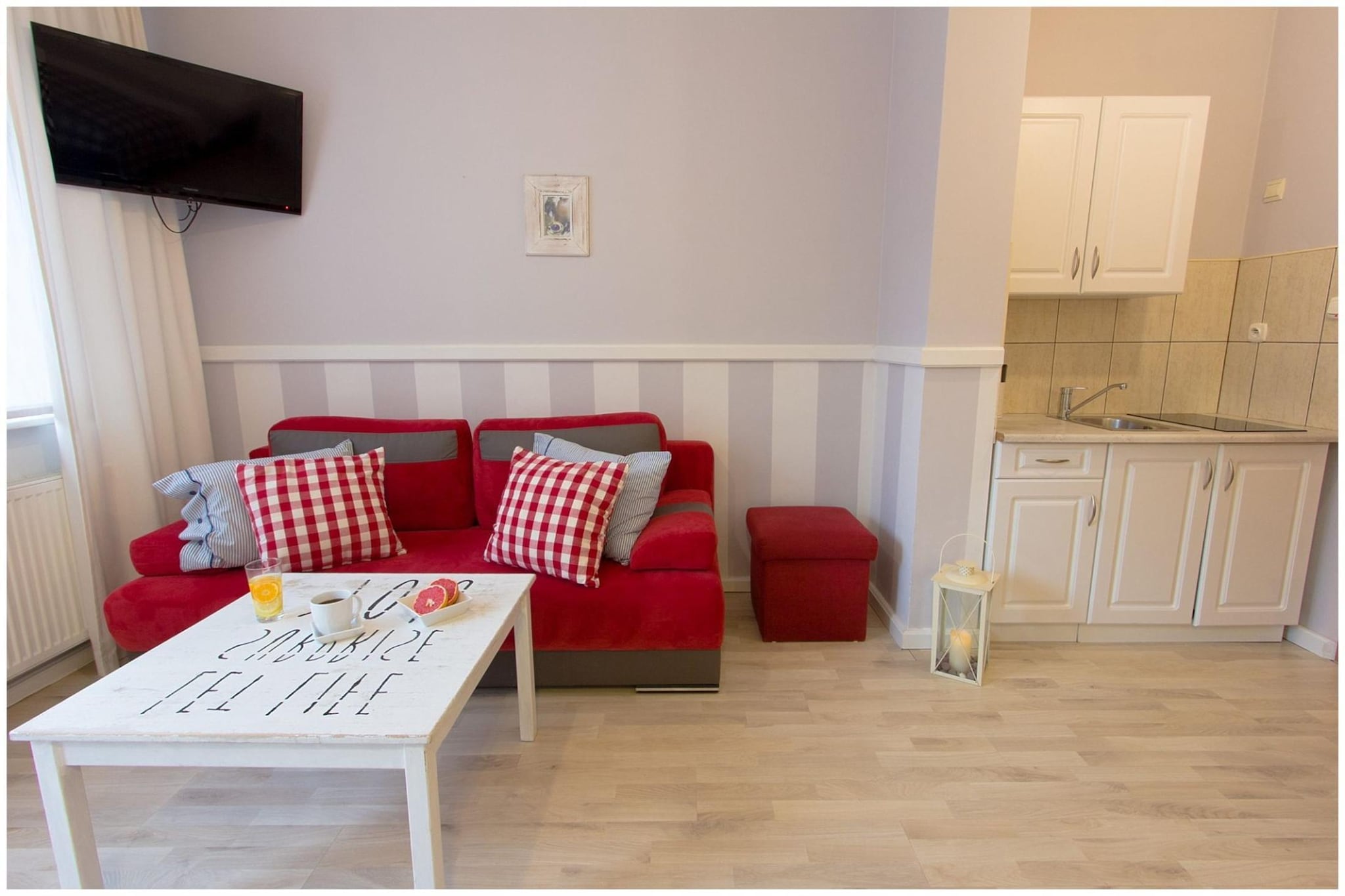 Ground floor: (Kitchenette(electric kettle, boiling water tap, cooker(2 ring stoves, electric), fridge), Living/bed room(single bed, double bed, TV(german television channels)), bathroom(shower, washbasin, toilet))\n\nplay equipment