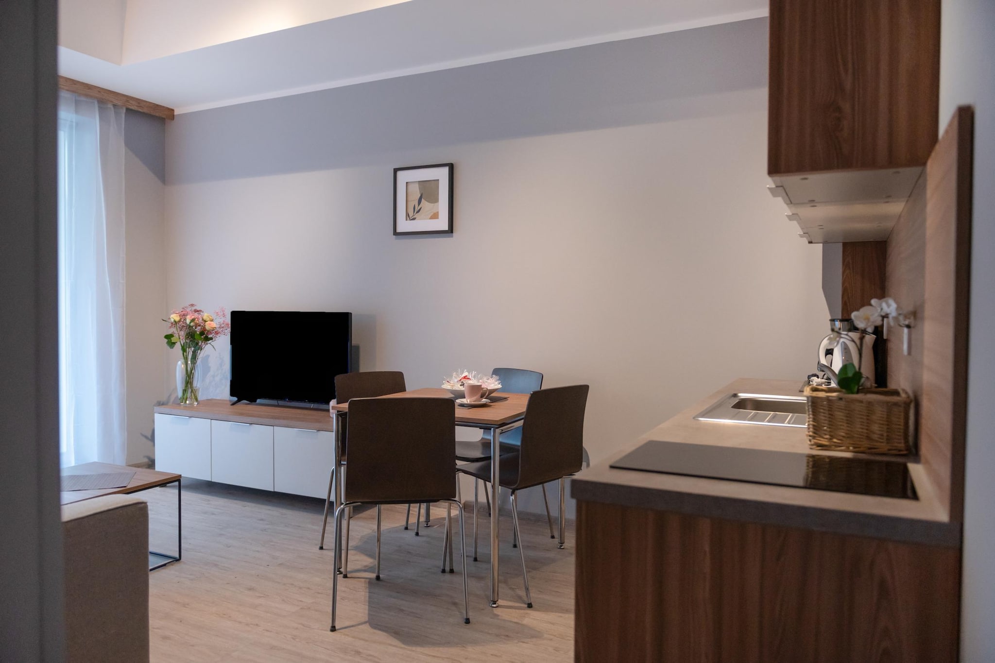 A complex of holiday apartments in the centre of the resort, 70 m from the seaside beach. In the immediate vicinity there are cafes and restaurants. There is also a hotel with SPA facilities (indoor pool, sauna, whirlpool), where you can use these attractions for an additional fee.

A comfortable apartment on the second floor (there is an elevator). It has a large balcony, where a set of garden furniture awaits. The apartment consists of a spacious living room, kitchen, bedroom and bathroom with shower. In the living room there is a fold-out 2-person sofa, TV and a table with chairs. Central heating. Wireless internet is available. There is a secure parking lot on the fenced area of ​​the complex.

The price of your stay includes: electricity and water consumption, heating, parking, internet. A cot and a high chair are available on request.

Pobierowo is a holiday resort in the West Pomeranian Voivodeship. It is located on the shores of the Baltic Sea, in the centre of the picturesque Rewal Coast.
As befits a seaside resort, Pobierowo offers tourists a clean beach and a guarded bathing area. There is also a fishing base here, perfect as a background for souvenir photos.

Children will be delighted with a visit to the Whale Park in nearby Rewal (approx. 7 km), with real sea giants. In bad weather, a trip to one of several public indoor pools will be an ideal option. A rope park will also be fantastic entertainment for the whole family or a group of friends. The pride of the town and the entire region is the renovated narrow-gauge railway, which can be used for a charming trip to neighboring resorts.