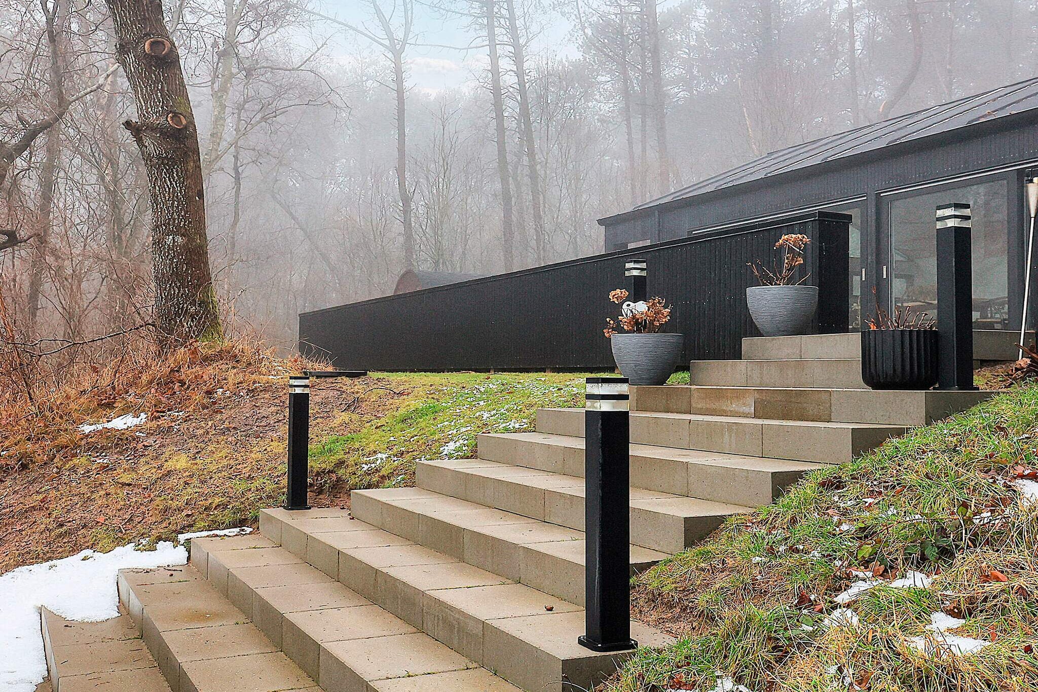 Living room, Kitchen(stove(induction), cooker(electric), coffee machine, oven, dishwasher, freezer(60-99L), fridge-freezer, tumble dryer, washing machine), Living/bed room(TV), bedroom(double bed), bedroom(double bed), bedroom(double bed), bathroom(washbasin, shower, toilet), bathroom(washbasin, shower, toilet), bath tub(outside, heated, 4 persons), sauna(outside, 4 persons), heating(electric), terrace, garden furniture, air to water heatpump