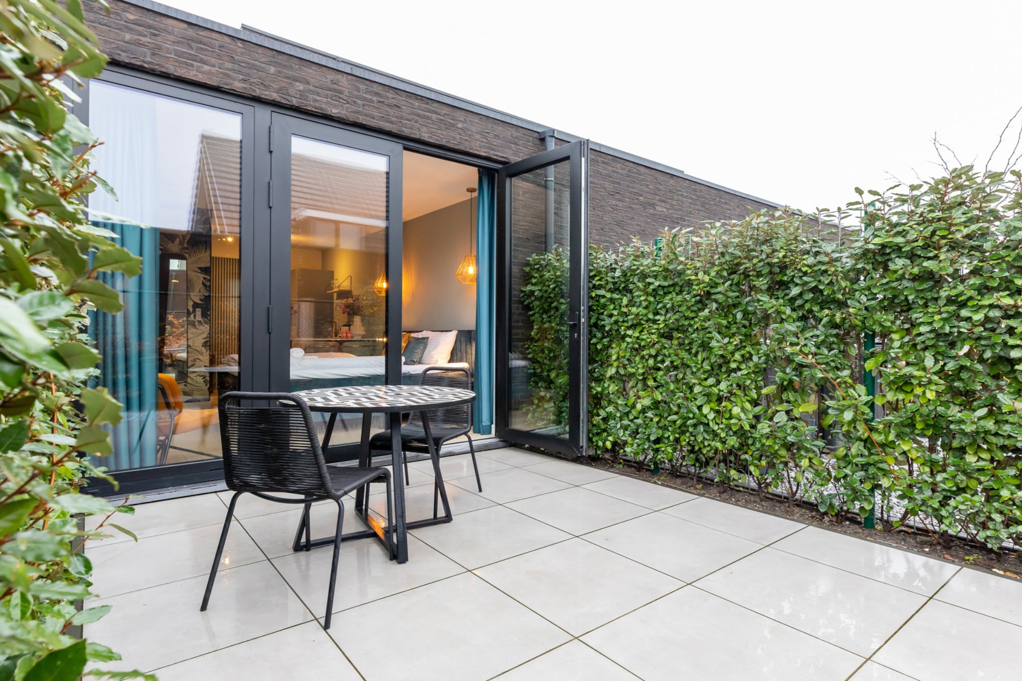 Ground floor: (Kitchenette(coffee machine, oven, washbasin), Living/bed room(double bed, TV), bathroom(shower, washbasin, toilet), air conditioning)\n\nterrace, garden, parking