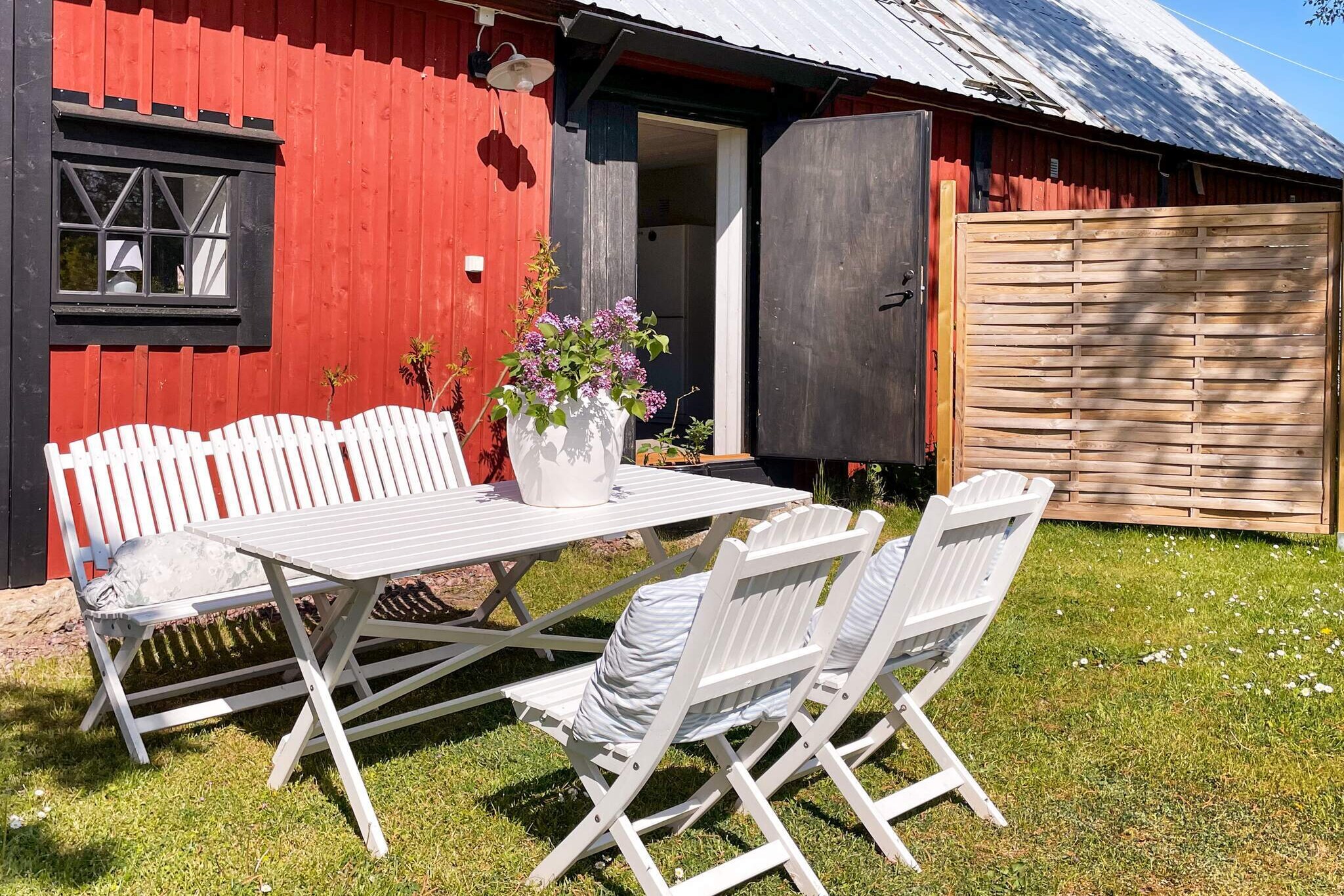 Welcome to a fantastic newly renovated barn house with a rural location in LÃ¥nglÃ¶t on Ã–land's east coast. The accomodation has been renovated with style and class and here you can really enjoy the lovely atmosphere and the fine material choices. Outdoor furniture is available directly outside the house or under the pergola if you prefer. A nice boule court is available for those who wish (boules balls are available to borrow). There is also a sauna in the bathroom that can be rented from the owner for an extra payment. You have your own part of the garden, the owner of the house who lives in the house next door mostly stays on the back side with a secluded location. The house has a large living room where you can enjoy the beautiful stone walls and an incredible space as the roof is open right up to the ridge. There is a stylish, spacious kitchen with dishwasher, dining area and a living room with TV. One entire gable is fitted with large window sections facing the road for nice light. A tall, beautiful spiral staircase leads you up to the upper floor where the bedrooms are. Please note that the accommodation is not suitable for small children or people with reduced mobility due to this stair. Directly above the stairs, screened off with glass railings, are two single beds. From here, you have a view of the barn, but can turn back towards the hallway that leads you into the wonderfully beautiful bedroom, where you sleep soundly directly under the ridge in a double bed. Here you can enjoy a fantastic view of the landscape with the sea in the distance. Between the bedrooms there is a bathroom with toilet and sink and a large wardrobe. You have another bathroom on the lower level with wc, sink, shower and a beautifully glazed sauna. The sauna can be used against extra payment to the home owner. It is possible to charge an electric car by agreement with the owner for a fee. Here you live in the countryside and can enjoy fantastic nature and nice walking paths. Ã–land's museum Himmelsberga is only 1.9 km away, where you can experience historic Ã–land farm environments. The coffee house offers coffee and a good lunch with fresh, locally grown, organic ingredients. Many activities are organized here for both adults and children. Take the opportunity to explore the slightly quieter East side, where you can find fantastic beaches, views and attractions. If you want to enjoy a wonderful sandy beach with jetty, you can go to BjÃ¤rby badplats, which is approx. 6km away. If you are looking for a nice event for the evening, there is Kackelstugan where you can enjoy great artists in a lovely environment during the summer. You also don't have far to the West side if you want a greater range of events, shops, restaurants and more well-visited beaches.