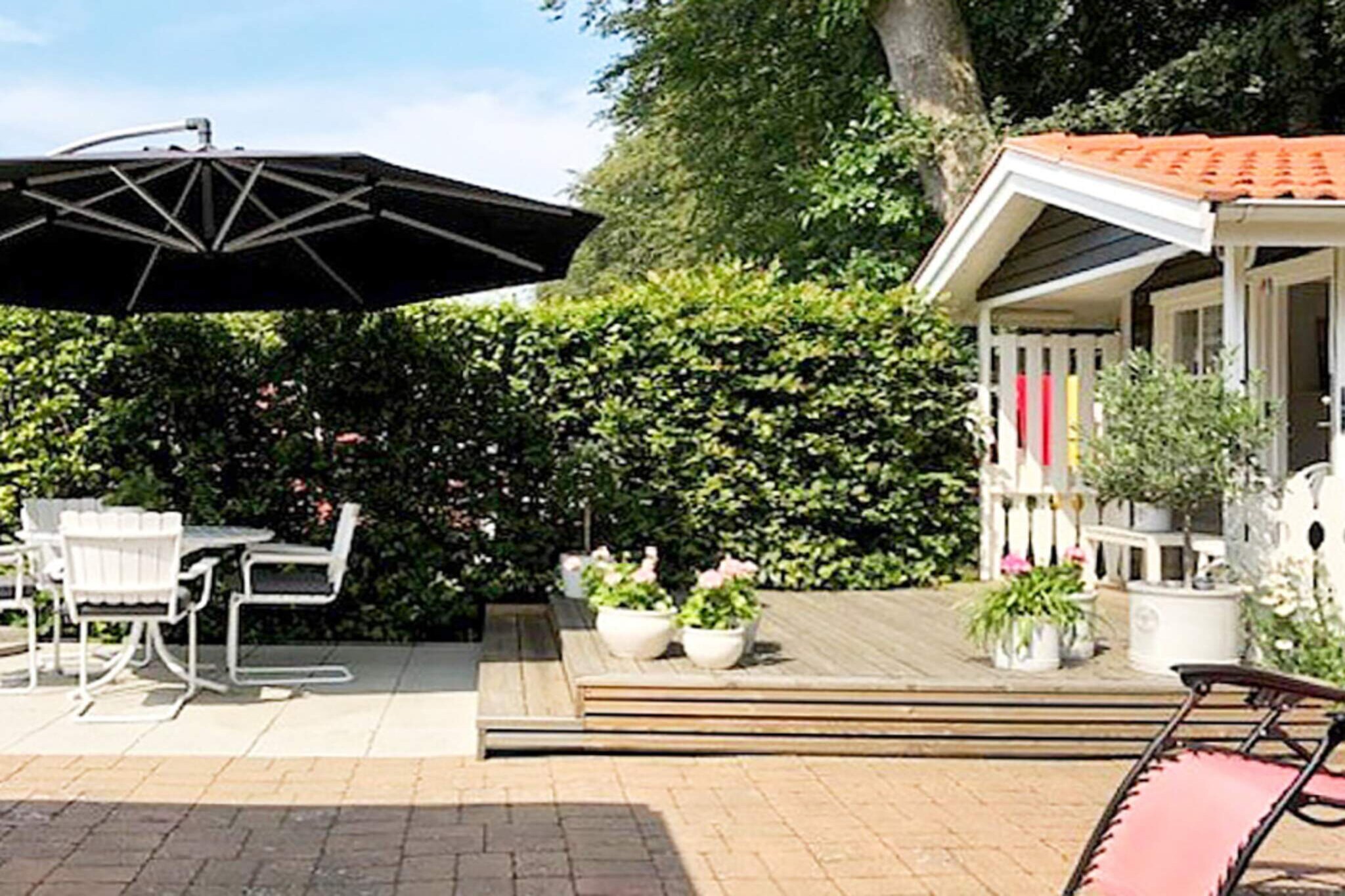 Fantastically nice and fresh holiday home with private courtyard for sun worshippers, activities and barbecues. A cooling outdoor shower on the hottest days can be nice even if the beaches of Hanö Bay are within walking distance. Also close to several restaurants in the Tredenborg area during the summer and only a couple of km to the small-town idyll of Sölvesborg. This brightly decorated house with an open floor plan invites you to pleasant moments in community. In an armchair in front of the fire, the smart TV or in peace and quiet with a good book. Long summer evenings can be enjoyed in the house's glass-enclosed conservatory if the outside temperature is not so high. The kitchen is equipped with amenities, as is the spacious bathroom with washing machine. The house has room for six people, however, the sleeping loft, which is adjacent to the bedroom, is recommended for children. A ladder up to the sleeping loft, which has a full-length double bed mattress on a floor with a low ceiling. There are two more single beds in the guest house. Excursions with daily boat trips from Nogersund to Hanö can be highly recommended to enjoy a unique landscape with varied terrain and a view of the Baltic Sea. Nature reserves and beaches replace each other along Listerlandet's coast, for example Sandviken, Västra Torsö and Hällevik. Fish restaurants with associated shops in Valje and Hörvik, among others. a. Those interested in football can watch an Allsvenskan match when Mjällby plays at the home arena. A day trip on one side to Österlen with its long white beaches and on the other side the entire beautiful Blekinge archipelago all the way to Torhamn. Everything is at your feet, so take the opportunity to vacation in Sweden's garden Blekinge with the proximity to Scania.