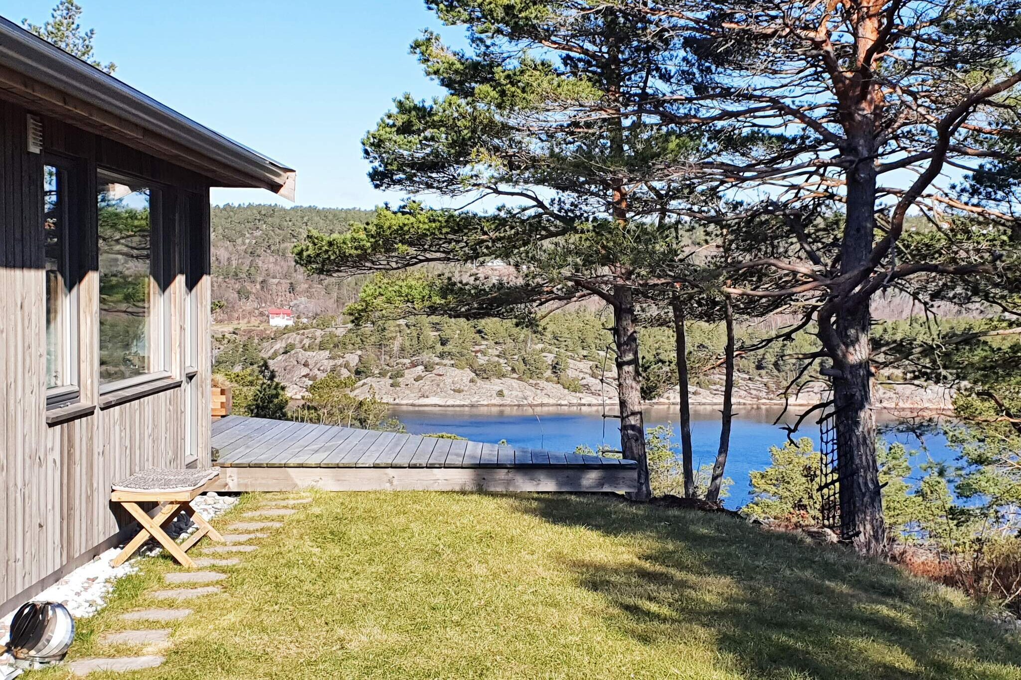 Great holiday home between the summer gems Risør and Gjeving in an idyllic and peaceful area with scattered leisure buildings. Fantastic view of the fjord and open sea. Great opportunities for swimming, boating, exploring the archipelago, and relaxation. Your pet is velcome! The holiday home has enough space for two families. On the ground floor there is a well-equipped kitchen and living room with TV and access to a terrace with garden furniture and barbecue, 3 bedrooms with double beds, a bathroom with steam shower with built-in infrared sauna (lovely after an active winter day) and an additional toilet room. In the loft there is a nice living room with table football and several board games as well as a bedroom with a double bed. Free internet. 4 bicycles and an inflatable rubber raft with paddles available, as well as fishing rods and crab traps. In the immediate vicinity are silky rocks with wonderful opportunities with a fishing rod and several beaches for swimming. Several hiking trails and excursion opportunities, for example to Jettegrytene on Sild or to one of the well-known towns along the coast. As well as having the sea right on the doorstep, there are also great opportunities for hikes in the woods, picking berries and mushrooms according to season. Hiking trail to Hisåsen, a fantastic vantage point towards Risør in the east and Lyngør in the west. Right below the cabin, you will find the Sandnesfjord, where there is a 15-foot boat with 25 hp for rent. If you don't want to drive a boat yourself, call a taxi boat and take a trip to Lyngør, Norway's best-preserved little town, or Stangholmen just outside Risør town with concerts in the summer. At Sørlandet Feriesenter, 2.5 km away, there are several outdoor pools in the summer, a ball pit, a large jumping pillow as well as a mini golf course and a playground. Tennis courts at Hope a little further. We recommend a visit to the saltwater aquarium in Risør or the Maritime Museum in Gjeving (15 km), as well as “The Little Zoo†with tropical rainforest on Brokelandsheia, approx. 33 km away. At Nes Verk (29 km) there is a golf course and Ironworks Museum with tours of the Solberg Mine. In winter, there are several cross-country trails in the area, otherwise you can take a trip to Vegårshei Ski and Activity Center, only 33 km away.