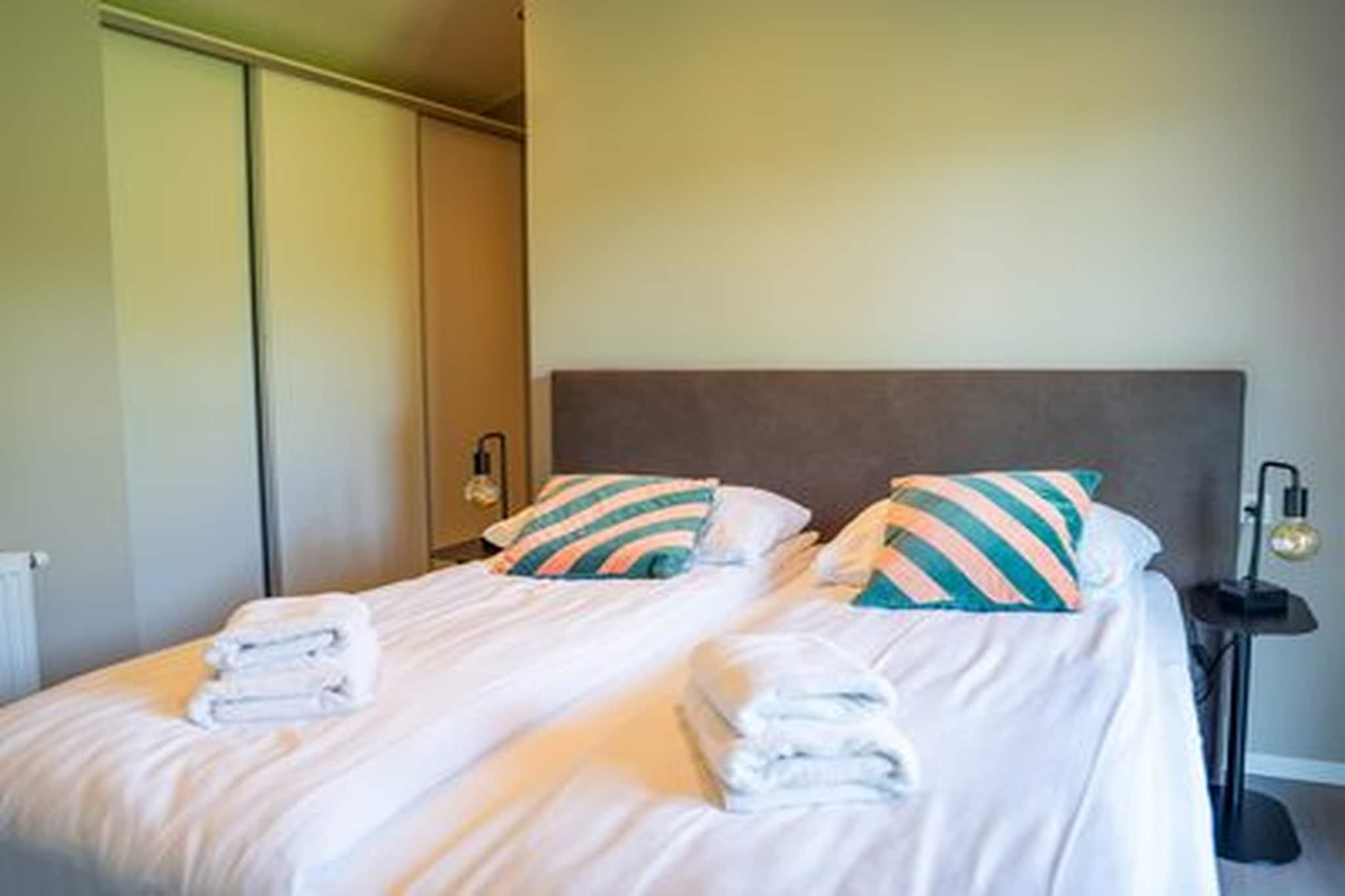 Ground floor: (Living room(TV), open kitchen(cooker(4 ring stoves, induction), coffee machine(cups), combination microwave, dishwasher, fridge(+ freezer)), bedroom(double bed), bedroom(2x single bed), bathroom(shower, washbasin, toilet))\n\nstorage, heating(central), air conditioning, terrace, garden, garden furniture, parking, swimming pool(shared with other guests, outside)