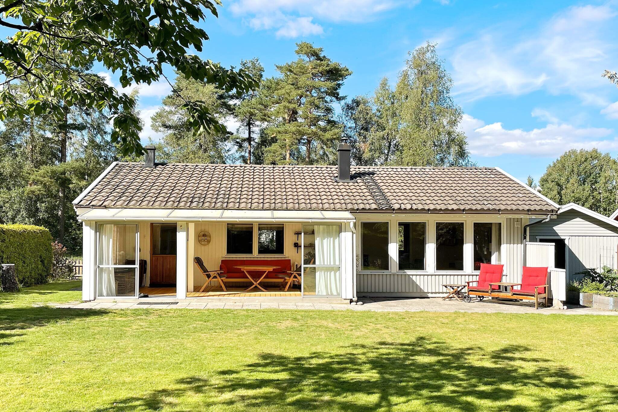 Welcome to a cozy cottage surrounded by forest and nature, a sanctuary for relaxation and adventure! This idyllic retreat offers a peaceful getaway for up to 6 people, perfect for families or friends longing for a relaxing vacation. With generous living spaces both indoors and outdoors, there's plenty of room to socialize and create memories that last a lifetime. The cottage invites you into an atmosphere of warmth and camaraderie. There are two bedrooms for a good night's sleep; one with a comfortable double bed and the other with a bunk bed suitable for children but also providing comfort for adults. Additionally, the living room offers a double sofa bed for extra guests or spontaneous movie nights. The bathroom is equipped with everything you need for your stay, and the spacious kitchen is perfect for preparing delicious meals to enjoy together at the dining table indoors or in the outdoor room. For sunny days or mild evenings, you can take advantage of the lovely outdoor room connected to the kitchen, where you can relax with a good book or spend time with loved ones while enjoying the beauty of nature. Outside the cottage, there is a large and lush garden, perfect for playtime or simply stretching out and enjoying the tranquility of nature. We ask you to respect the private spaces and note that the fireplace in the house is out of order and should not be used. The washing machine can be accessed from outside through the storage room to the right of the entrance. You have nature right on your doorstep, and you may even see a squirrel or two passing by. Just under 2 kilometers away, you have Lake SÃ¶vdesjÃ¶n where you can swim and buy an ice cream from the small kiosk. It's an incredibly beautiful lake with a jetty and a small sandy beach! If you want to go on excursions throughout Ã–sterlen, this place is very conveniently located. You have the beach and outdoor swimming facilities down at Nybrostrand just a short drive away. You have Ystad, Simrishamn, Tomelilla if you want to shop, dine well, or just stroll around. There's a highly recommended cafÃ© down here called &quot;Olof Viktors&quot;. A few miles away, you have Ales Stenar, KÃ¥seberga, and several lakes for swimming and fishing. You can even take the ferry from Ystad to the charming island of Bornholm. Welcome to a place you'll definitely want to return to!