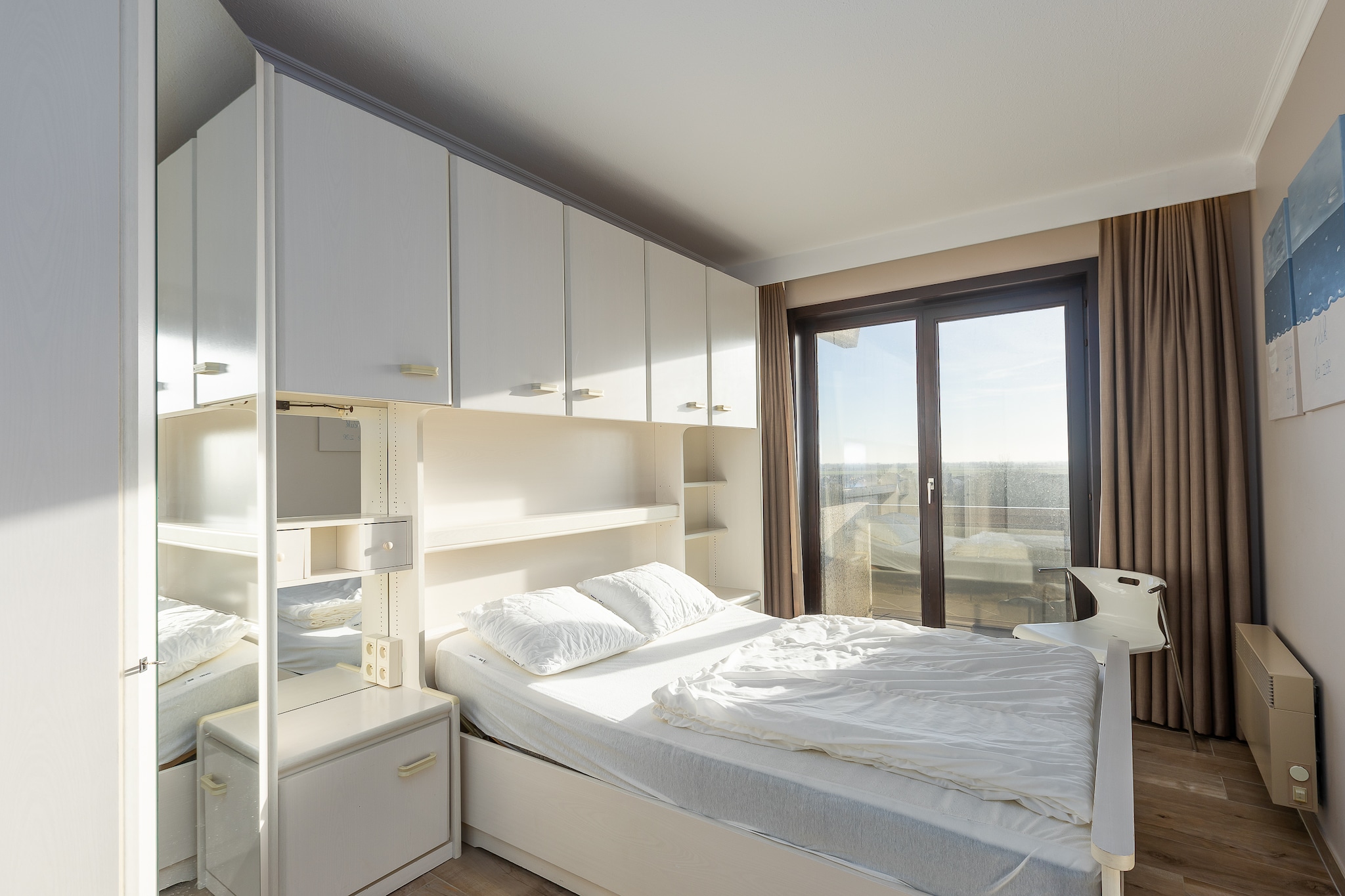 On the 3rd floor: (open kitchen(electric kettle, toaster, coffee machine, oven, microwave, dishwasher, fridge-freezer, Blender, dishes and cutlery, Cooking basics), Living/diningroom(double sofa bed(twin duvet, 140 x 200 cm), TV(digital), dining table, radio), bedroom(double bed(twin duvet, 140 x 200 cm)), bedroom(double bed(twin duvet, 140 x 200 cm)), bathroom(shower, washbasin, toilet), bathroom(bathtub with shower, washbasin, toilet), toilet(toilet))\n\nInternet access, heating(electric), terrace, bicycle storage, bicycle storage, parking, lift