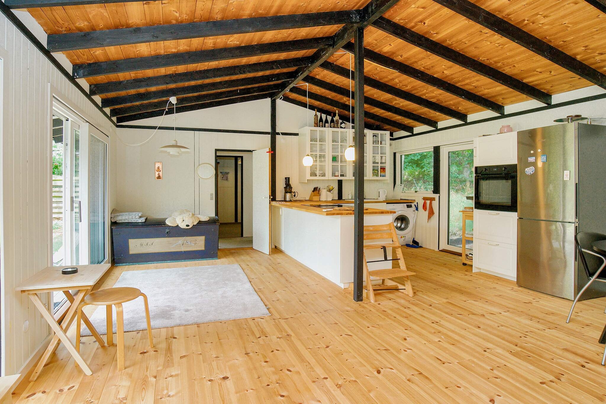 Kitchen(oven, microwave, dishwasher, fridge-freezer, washing machine), Living/bed room(double folding bed, TV), bedroom(2x single bed), bedroom(single bed), bathroom(washbasin, shower, toilet), heating(electric), terrace, garden furniture, air to air heatpump