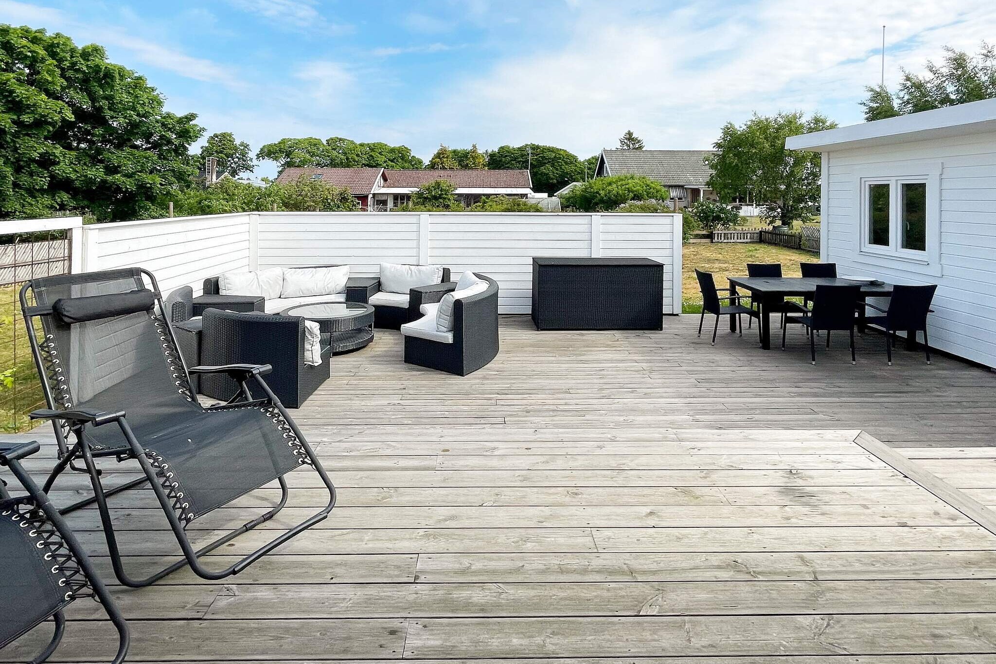 Lovely chain house in the middle of the summer paradise KÃ¶pingsvik where you are within walking distance to KÃ¶pingsvik's wonderful sandy beach and its wide range of restaurants and entertainment. Please note that the house is not rented out for parties or to youth groups. The house has a large balcony deck on two floors. One with a covered conservatory where you can lean back in the built-in lounge furniture with something good in the glass. If you want to enjoy the sun, you have the large sun deck with outdoor furniture or the garden. The house has a lovely open living room with a luxurious kitchen, lovely dining area and the living area in front of the TV. Here you have plenty of space to hang out and prepare nice meals. You sleep in four bedrooms. One on the entrance floor with a double bed. The remaining three bedrooms are on the upper floor, two smaller ones with a double bed and one with a single bed and a family bunk bed. In this bedroom there is also a sofa bed if someone would rather sleep there. On the lower level there is a toilet with a sink. On the upper floor, a nice bathroom with wc, shower and sink. Laundry room with washing machine available. Take a trip to Borgholm, where you can stroll around and enjoy the atmosphere and the wide range of everything that brightens up the holiday. Also, don't miss visiting Borgholm's Castle Ruins, where you can really feel the wings of history. Concerts are organized here during the summer that you don't want to miss. A large fun playground is easily accessible for the children just 250m away.