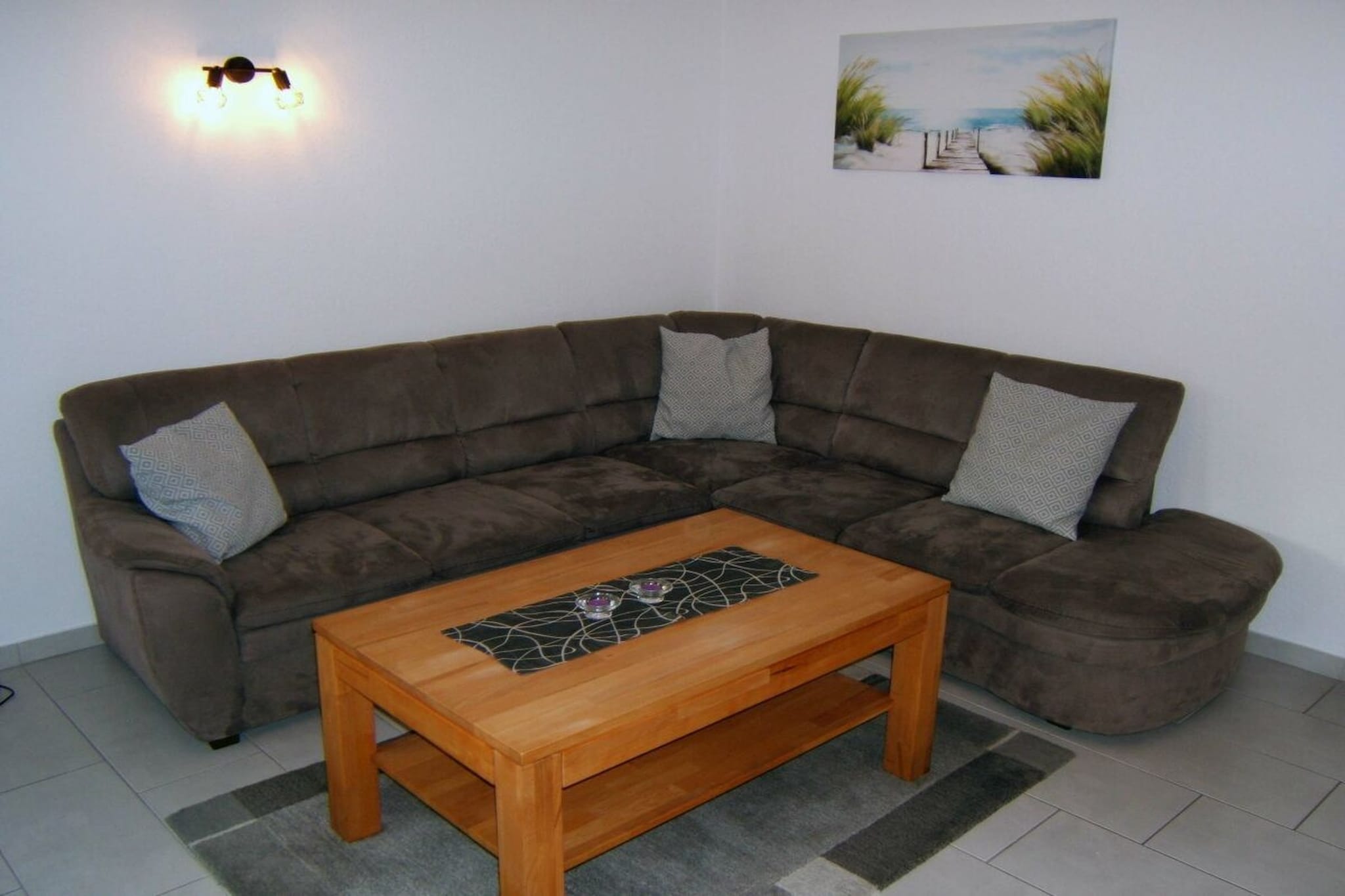 95 m² holiday apartment on the first floor of an apartment building, south-facing balcony, 3 bedrooms, 5 beds and a children's bed