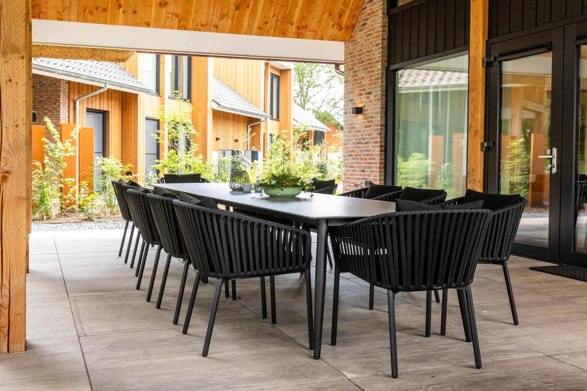 Ground floor: (Living room(seating area), dining room(dining table), open kitchen(cooker, coffee machine, oven, microwave, dishwasher, fridge-freezer), Bedroom with bathroom(double bed, shower, washbasin, toilet), Bedroom with bathroom(double bed, shower, washbasin, toilet))\n\nOn the 1st floor: (Bedroom with bathroom(double bed, shower, washbasin, toilet), Bedroom with bathroom(double bed, shower, washbasin, toilet), Bedroom with bathroom(bunk bed or 2 single beds, bunk bed or 2 single beds, shower, washbasin, toilet))\n\nBasement: (hot tub, shower, toilet, sun loungers, private indoor pool)