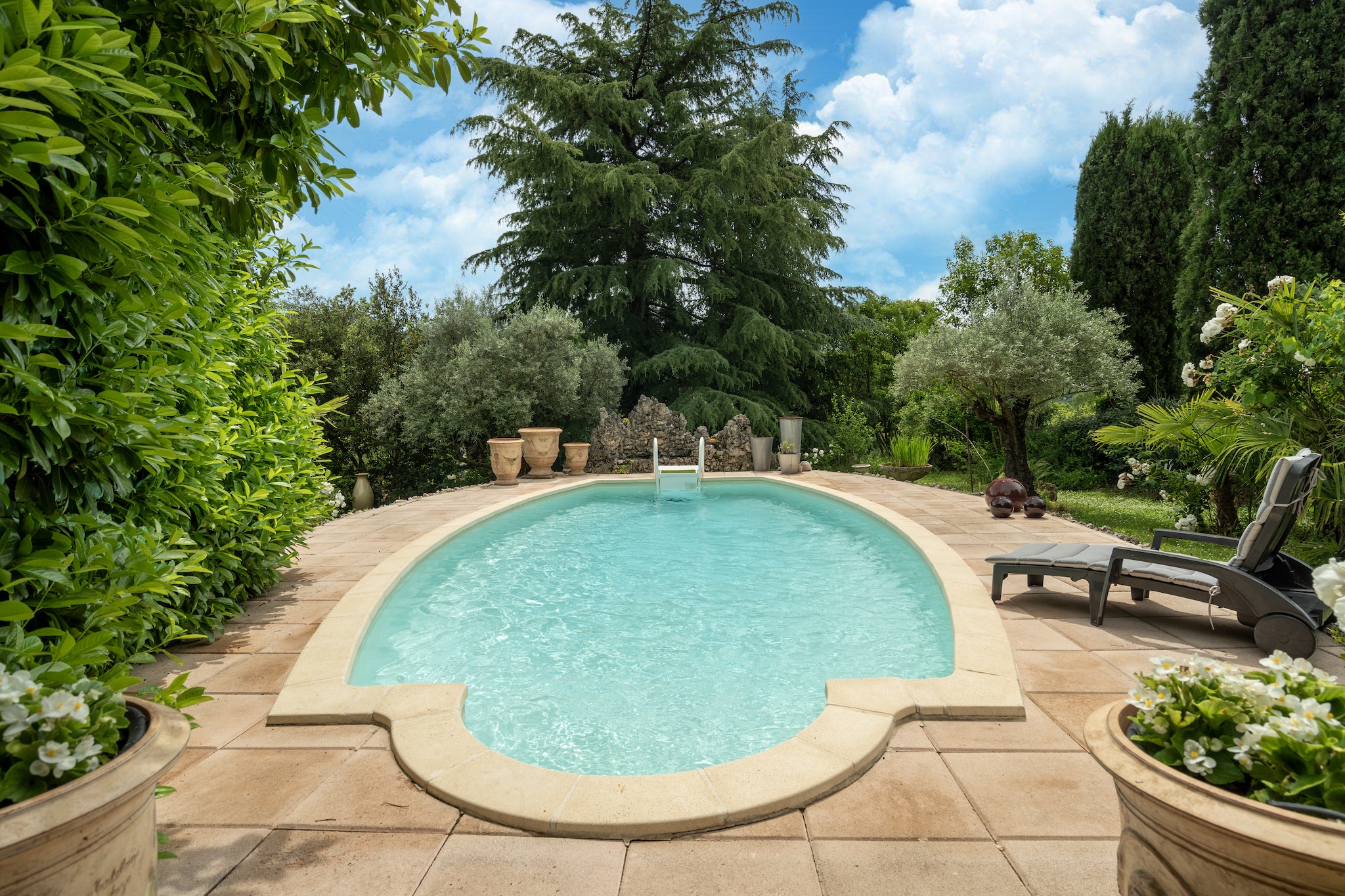 Majestic holiday home in Laroque with hot tub