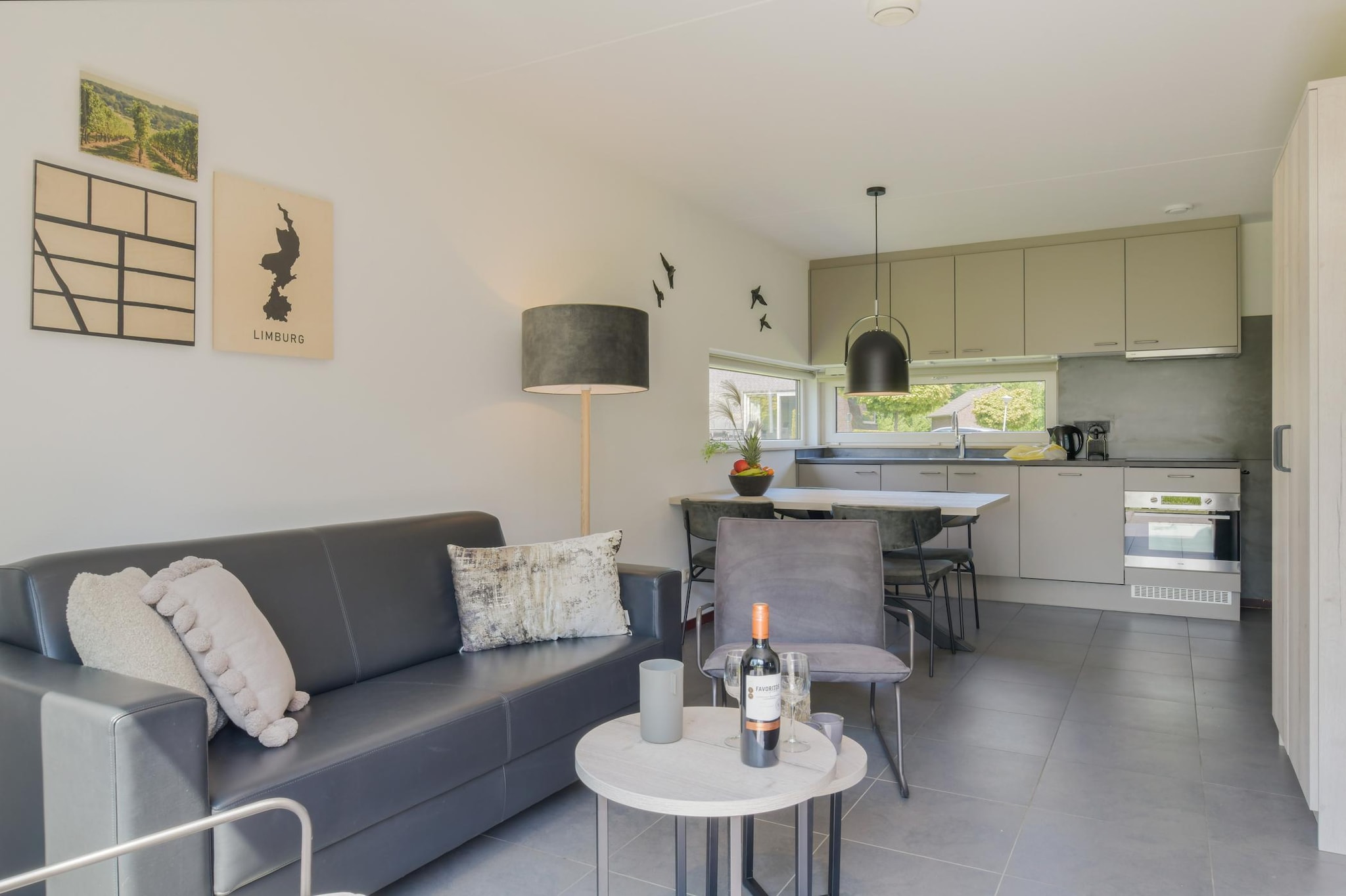 This detached, wheelchair-friendly holiday home is located in the small-scale holiday park Reevallis, in the beautiful hilly landscape of South Limburg, on the edge of the village of Vijlen. It is located at 8 km from the Tripoint in Vaals. Maastricht (25 km) and Valkenburg (17 km) are easily accessible.

The holiday home is neat and comfortably furnished, has a beautiful view of the hilly landscape and covers two floors. On the ground floor there is a living room with TV. The living room has a turning circle of at least 150 cm. There is an open-plan kitchen which includes a microwave and dishwasher. The dining table is at least 70 cm high and suitable for sitting in a chair or a wheelchair. There is a bedroom with an ensuite bathroom with a walk-in shower and a raised toilet with safety rails. There is room in the bedroom to place a high/low bed and the turning circle is at least 150 cm. On the first floor you will find the second bedroom with TV and a second bathroom with bath, shower and toilet. The bedrooms have two single beds set up as a double. The door width is at least 85 cm. and the holiday home is barrier-free.

Outdoor life takes place in the garden with wheelchair-accessible terrace and garden furniture. In summer there are some sun loungers. The access path to the holiday home is paved, the terrace has a charging point for a wheelchair and/or mobility scooter. There is parking for one car directly at the holiday home. There are also central parking spaces at the holiday park.

At Holiday Park Reevallis, various bungalows and holiday homes can be booked for two to six people.