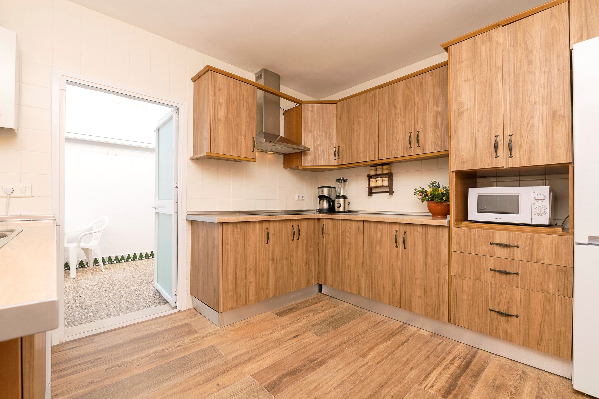 Living room, dining room, Kitchen(cooker, coffee machine), bedroom(2x single bed), bedroom(single bed, single bed), bedroom(double bed), bathroom, bathroom, bathroom, microwave, dishwasher, fridge-freezer, bath tub, bath tub, shower, washbasin, washbasin, washbasin, toilet, toilet, toilet, bidet, bidet, balcony or terrace, air conditioning, air conditioning, BBQ, children\'s bed, high chair