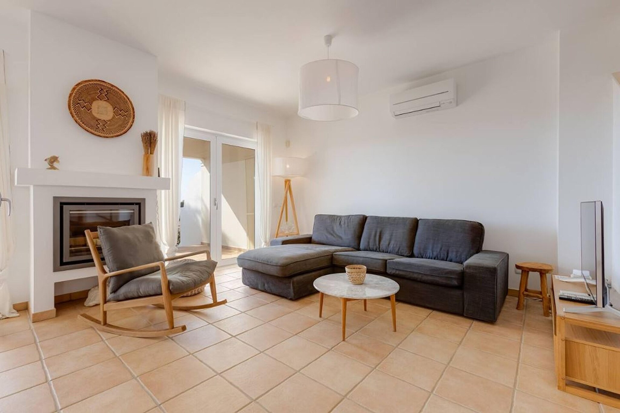 Absolutely stunning modern semi-detached villa with incredible panoramic sea views.
This beautiful house consists of 2 bedrooms, both very bright and spacious on the ground floor. One is en-suite and the other has a separate bathroom. Both bedrooms have access to one of the terraces where you can relax on the sun loungers and also have access to the pool area. The swimming pool is shared only between the other 5 houses in the urbanisation.
The entrance to the house is from the upper floor, where you will find the main kitchen, a large living room, a guest toilet and a second terrace overlooking Meia Praia.
The roof terrace is magnificent with a fully equipped kitchen, dining room and lounge - by far the best feature of the house!
The development is situated in a quiet residential area, within walking distance to the Marina, Lagos Centre and Meia Praia.
A holiday accommodation option you won't regret!