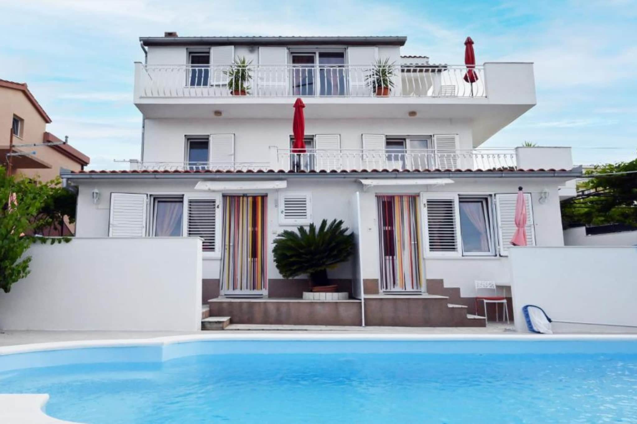 Apartments Mihovilović - 50 m from beach - Two Bedroom Apartment with Terrace and Pool View (A1)