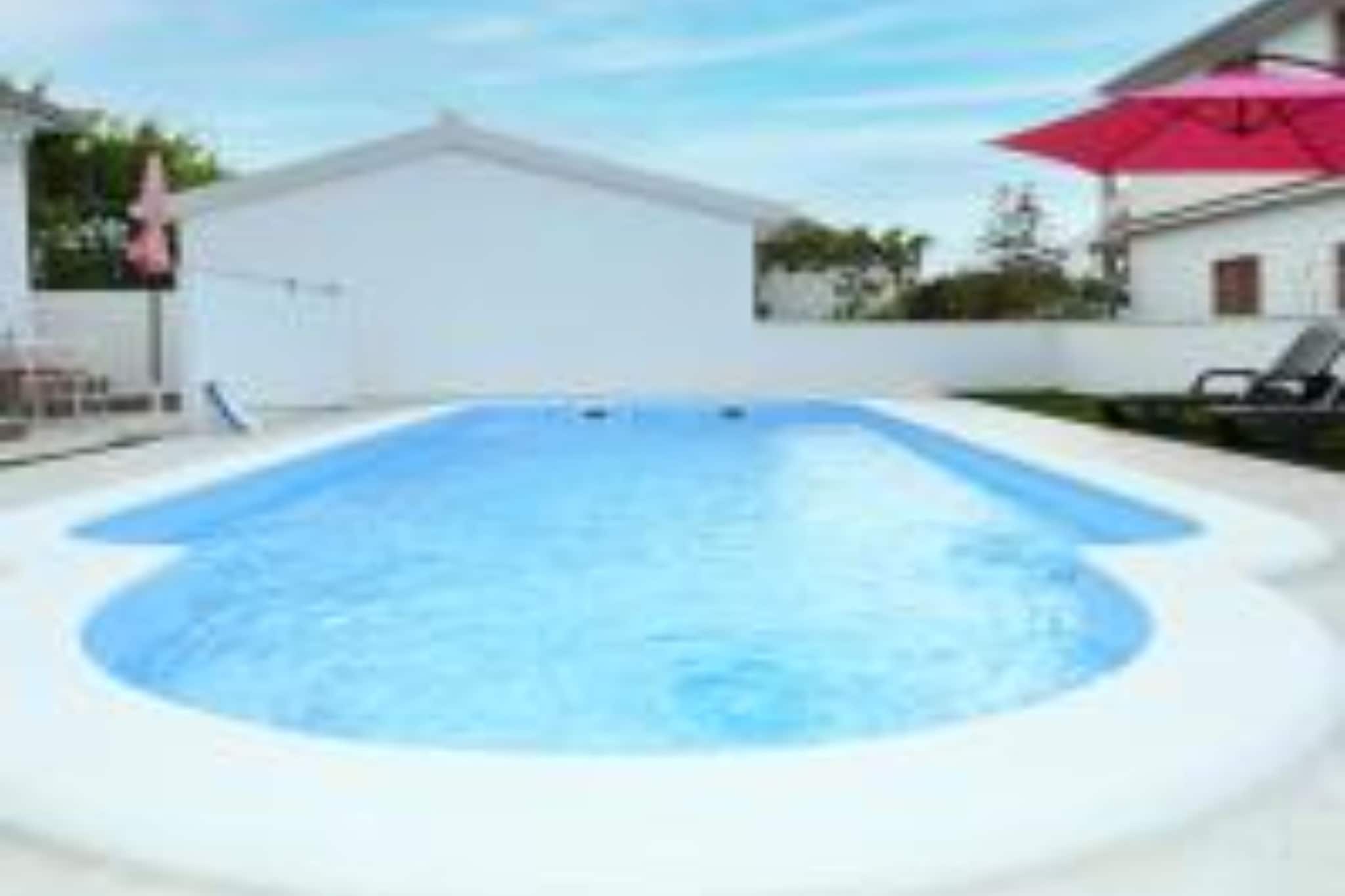Apartments Mihovilović - 50 m from beach - Two Bedroom Apartment with Terrace and Pool View (A1)-Zwembad