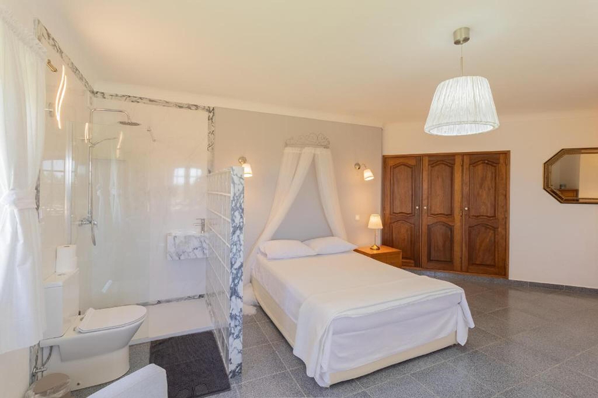 Ground floor: (Entrance(shared with other guests, reachable from the outside), open kitchen(hob, electric kettle, toaster, hood, coffee machine, oven, microwave, dishwasher, fridge-freezer), Living/diningroom(TV(flatscreen, satellite, international television channels), dining table, fireplace, seating area), bathroom(shower, washbasin, washbasin, toilet, bidet), terrace(private))\n\nOn the 1st floor: (Living room(seating area), bedroom(double bed, balcony or terrace), bedroom(double bed), bedroom(single bed, single bed), Bedroom with bathroom(double bed, shower, washbasin, toilet, hairdryer), bathroom(bathtub with shower, washbasin, toilet, bidet), bathroom(bathtub with shower, washbasin, toilet), bathroom(bathtub with shower, washbasin, toilet))\n\nwashing room(washing machine, ironing board, iron), garden doors, garden(private, 7200 m2), garden furniture, BBQ(charcoal), parking, swimming pool(private, outside, opened from Jan upto and including Dec), hammock, hammock, hammock, hammock, hammock, hammock, hammock, hammock