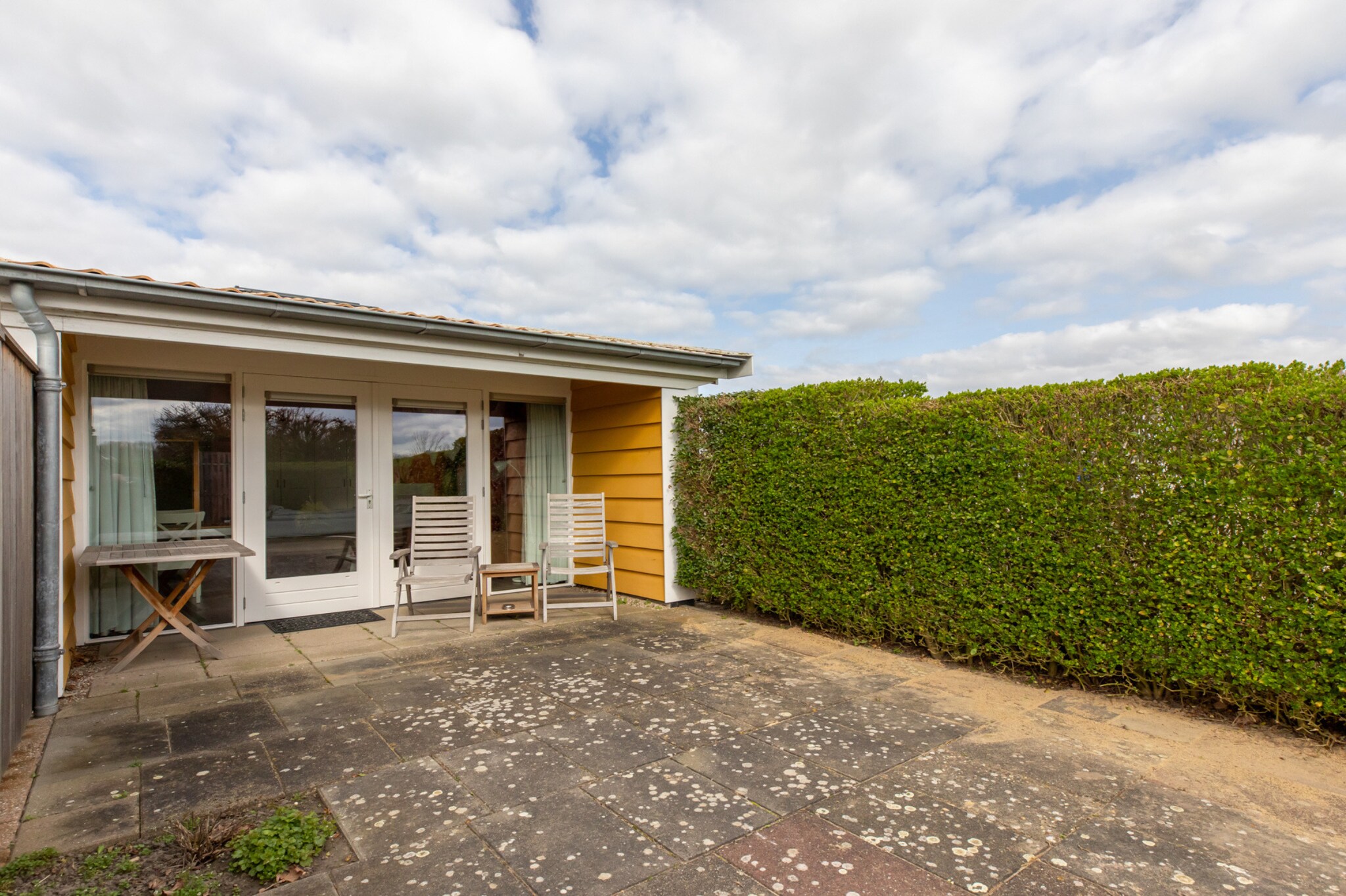 Ground floor: (Kitchen(electric kettle, cooker, coffee machine, combination microwave, dishwasher, fridge-freezer), Living/bed room(double bed or 2 single beds, TV, dining table, seating area), bathroom(bath tub, shower, washbasin))\n\nterrace, garden, BBQ, parking