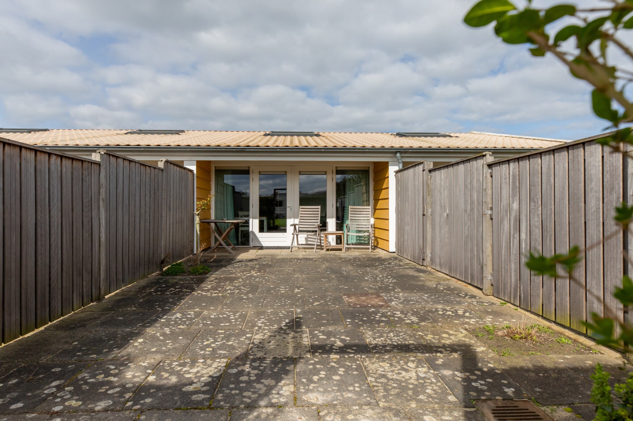 Ground floor: (Kitchen(electric kettle, cooker, coffee machine, combination microwave, dishwasher, fridge-freezer), Living/bed room(double bed or 2 single beds, TV, dining table, seating area), bathroom(bath tub, shower, washbasin))\n\nterrace, garden, BBQ, parking