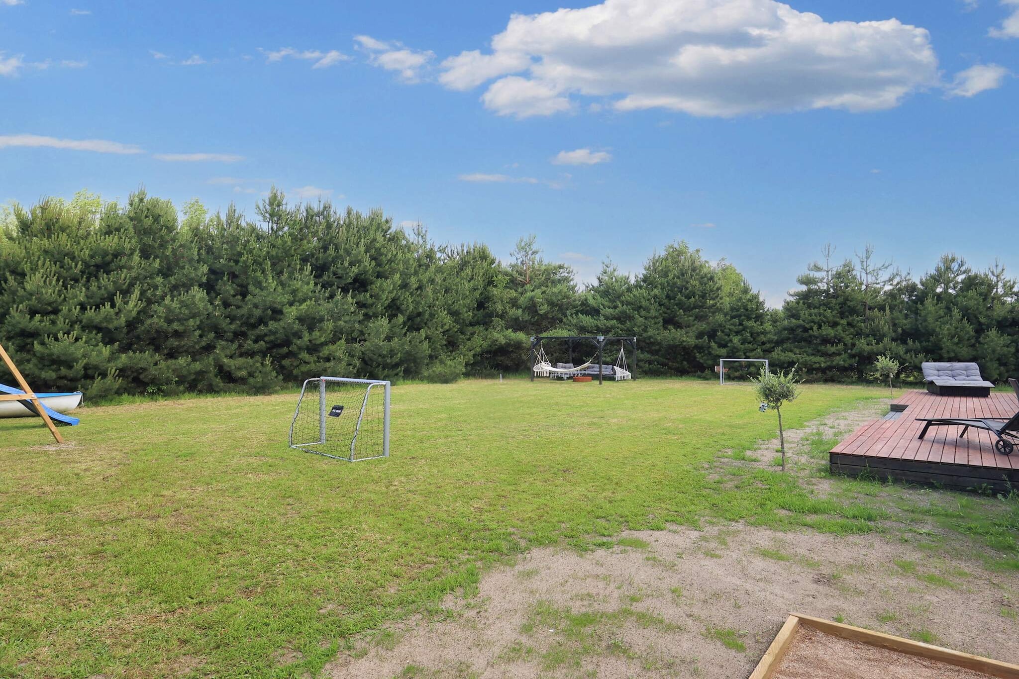 Internet Access DSL, Kitchen(stove(induction), coffee machine, dishwasher, fridge-freezer), Living/bed room(TV, table football, darts), bedroom(double bed), bedroom(double bed, TV, game computer, chromecast), bedroom(3x bunk bed), bathroom(washbasin, shower, toilet), washing machine, terrace, garden furniture, deckchairs, play equipment, air to water heatpump