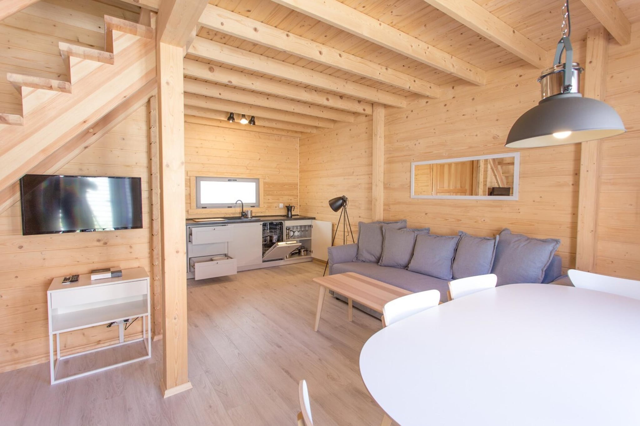 The intimate, family holiday resort is located in a safe, fenced area 650 m from the seaside beach.
A comfortable, modern holiday home, 2-story, with a covered terrace and a set of garden furniture. On the ground floor there is a spacious living room (TV, table with chairs, fold-out sofa) connected to the kitchen. There is also a bathroom with a shower on the ground floor. On the first floor there are 2 double bedrooms. No internet.
There is a parking lot on the well-kept property (1 space/house included in the price of the stay) and an attractive playground.
The price of the stay includes: bed linen, towels, electricity and water consumption, parking (1 place), final cleaning. Baby cot and high chair available on request.
Attractions in the area:
Pobierowo is a holiday resort on the shores of the Baltic Sea. As befits a seaside town, Pobierowo offers tourists a clean beach and a guarded swimming area.
Pobierowo is a perfect place for children, athletes and lovers. There are many romantic spots for two here. There is a parrot house, an oceanarium and giant inflatable playgrounds.
Children will be delighted with a visit to the Whale Park in nearby Rewal (approx. 7 km), with real sea giants, and to the Fairy Tale Cottage, where they will meet face to face with fairy-tale characters. In bad weather, an ideal option will be a trip to one of several public indoor swimming pools. A rope park offering plenty of obstacles to overcome suspended high in the treetops will also be fantastic entertainment for the whole family or a group of friends. Of course, with appropriate protection.
The pride of the town and the entire region is the renovated narrow-gauge railway, which allows you to go on a charming trip to neighboring resorts.