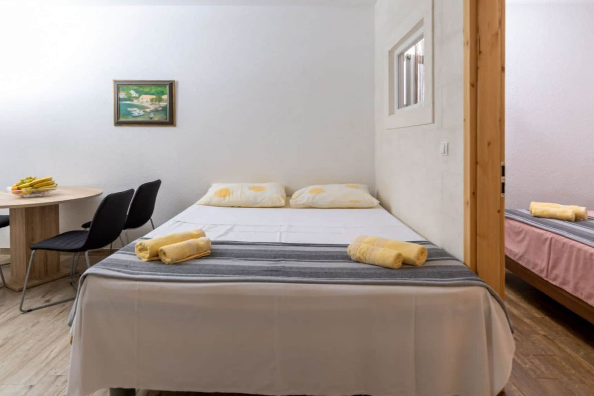 Apartments Šer Zane - One Bedroom Apartment with Terrace and Sea View (4)-Chambre
