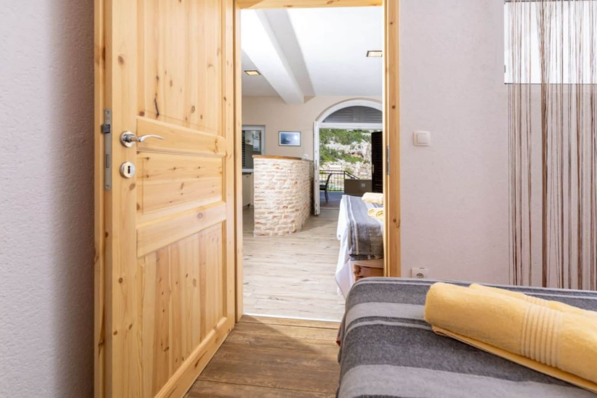 Apartments Šer Zane - One Bedroom Apartment with Terrace and Sea View (4)-Chambre