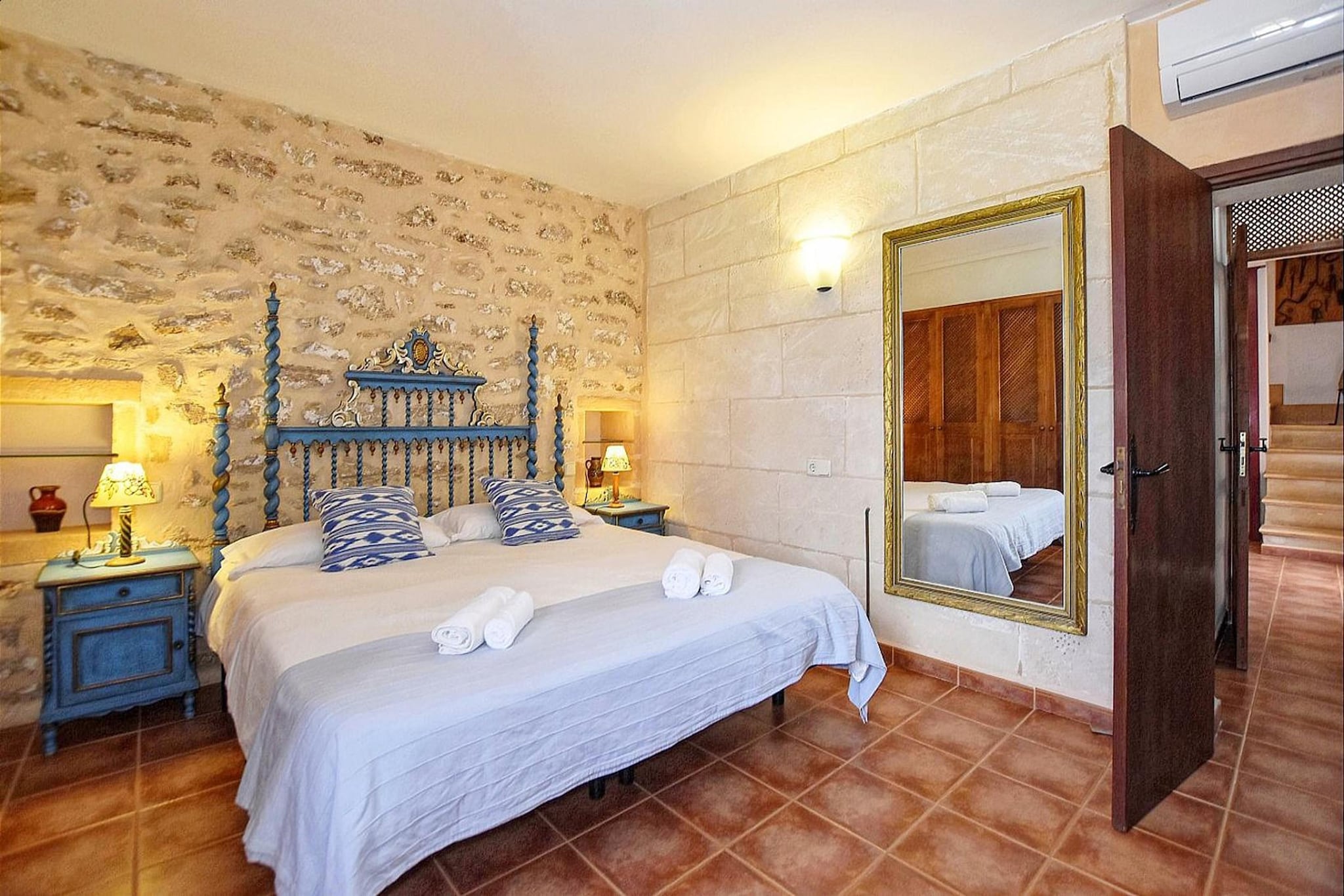 On the 1st floor: (dining room(dining table, air conditioning), Kitchen(dining table, toaster, coffee machine, oven, microwave, dishwasher, fridge-freezer, Blender, dishes and cutlery, heating), Bedroom with bathroom(double bed, bathtub with shower, washbasin, toilet, air conditioning, heating))\n\nOn the 2nd floor: (Living room(TV, seating area, air conditioning), bedroom(single bed, air conditioning), Bedroom with bathroom(single bed, single bed, shower, washbasin, toilet))\n\nOn the 3rd floor: (Bedroom with bathroom(single bed, single bed, shower, washbasin, toilet, air conditioning))\n\nGuest house ground floor: (Living room(TV, seating area, fridge-freezer, washing machine, air conditioning), bedroom(single bed, single bed), bathroom(shower, washbasin, toilet))\n\nbathroom, veranda(seating area), garden, garden furniture, BBQ, parking, swimming pool(private, 10 x 10 m.), play equipment, hammock, plancha grill