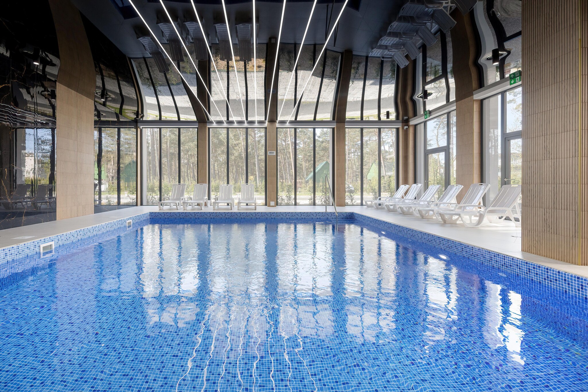 Perfect location, in a quiet area, 450 m from the sea. 500 m to the center of the resort. The modern apartment complex is an ideal place for a holiday. Guests have access to a year-round indoor swimming pool.
The comfortable holiday apartment is located on the second floor (there is an elevator) and is prepared for 4 people. It has a balcony with a set of garden furniture. The apartment consists of a living room connected to the kitchen, a bedroom and a bathroom with a shower. The living room has a 2-seater sofa, table and TV. The equipment includes a washing machine, iron and hair dryer. Central heating. Wireless internet is available.
The price of the stay includes: electricity and water consumption, internet, use of the swimming pool, parking, baby cot and high chair (prior reservation required).
Pobierowo is a holiday resort in the West Pomeranian Voivodeship. It is located on the shores of the Baltic Sea. Pobierowo offers a clean beach and a guarded swimming area. A perfect place for children, athletes and lovers. There are many romantic spots for two here. There is a parrot house, an oceanarium and giant inflatable playgrounds.
Children will be delighted with a visit to the Whale Park in nearby Rewal (approx. 7 km), with real sea giants, and to the Fairy Tale Cottage, where they will meet face to face with fairy-tale characters.
The pride of the town and the entire region is the renovated narrow-gauge railway, which allows you to go on a charming trip to neighboring resorts.