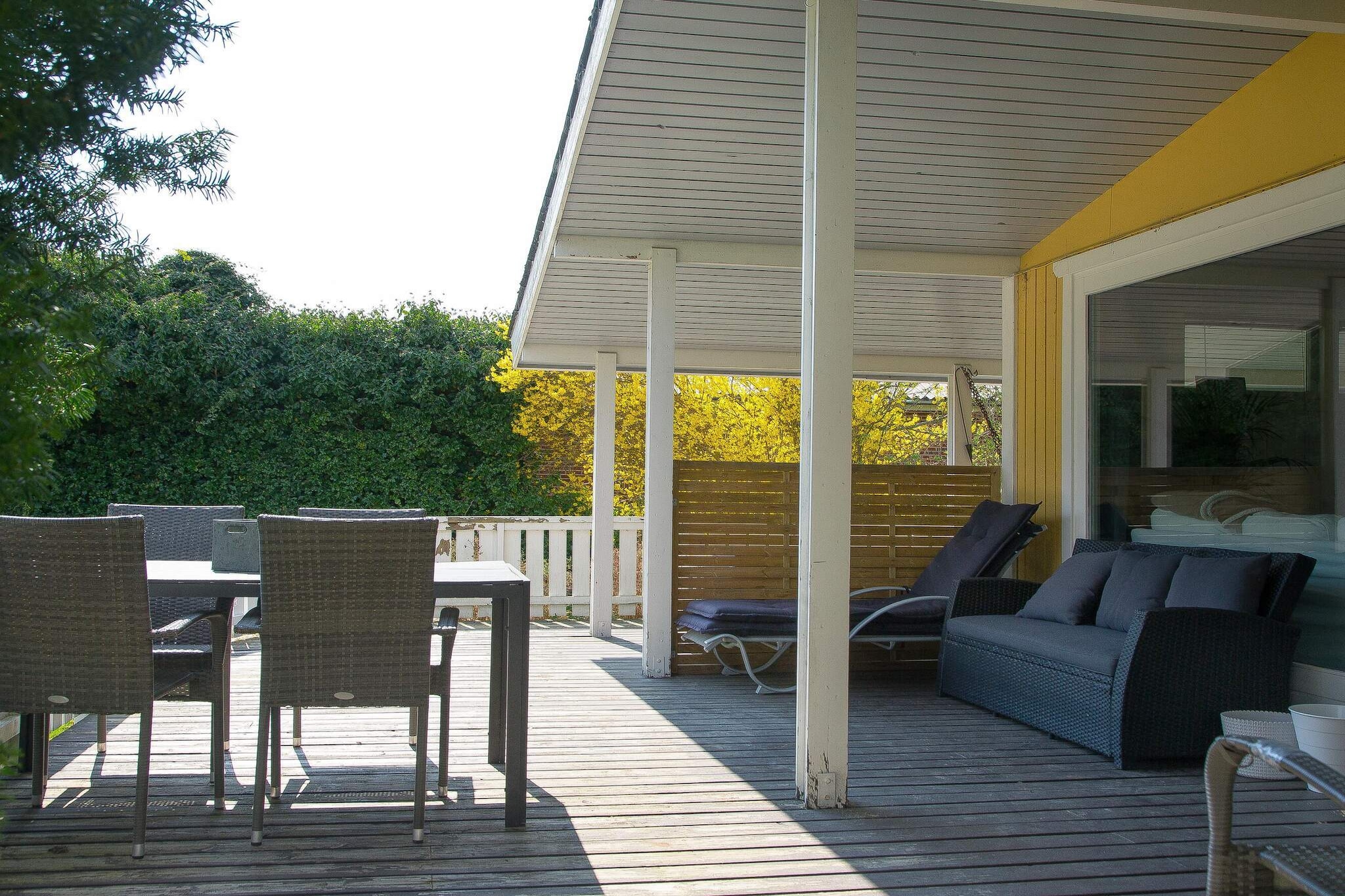 This cozy 66m² summer house offers the perfect coastal retreat, situated just about 200 meters from a wonderful, child-friendly sandy beach. The heart of the home is a delightful, bright, and open-plan kitchen, dining, and living area, which provides direct access to both a covered and an open terrace. The house comfortably accommodates guests with two bedrooms: one features a double bed and a single bed, while the second contains one single bed. Additionally, there is sleeping capacity for one person on a sofa bed in the living room, bringing the total capacity up to five. The interior is completed by a neat and well-kept bathroom. The outdoor spaces are designed for relaxation and enjoyment; the terraces are where the wine is opened, the grill is lit, and you can sit back and soak up the sun. For additional outdoor living space, the property features a lovely, open pergola. While a caravan is located on the plot, it remains locked, but guests are welcome to make use of the accompanying awning as an extra sheltered area. The location is truly excellent, offering immediate access to the outdoors. You are only about 200 meters away from the fantastic sandy beach, perfect for swimming and sunbathing. Furthermore, it is just a short 1.4 km walk to the very charming Havnsø harbor, which buzzes with a cozy atmosphere and offers plenty of restaurants and places to relax and enjoy the coastal life.A refundable deposit might be charged closer to your check-in date. The security deposit ensures a smooth stay and covers any additional services or consumption charges.This deposit covers utilities consumed during your stay and any additional services that may be taken.The final amount will be adjusted based on actual meter readings, actual usage of extra services, and any remaining balance will be refunded within 21 days after checkout.This deposit simply acts as a prepayment for charges that you would anyways pay for, ensuring a seamless stay and check-out experience.