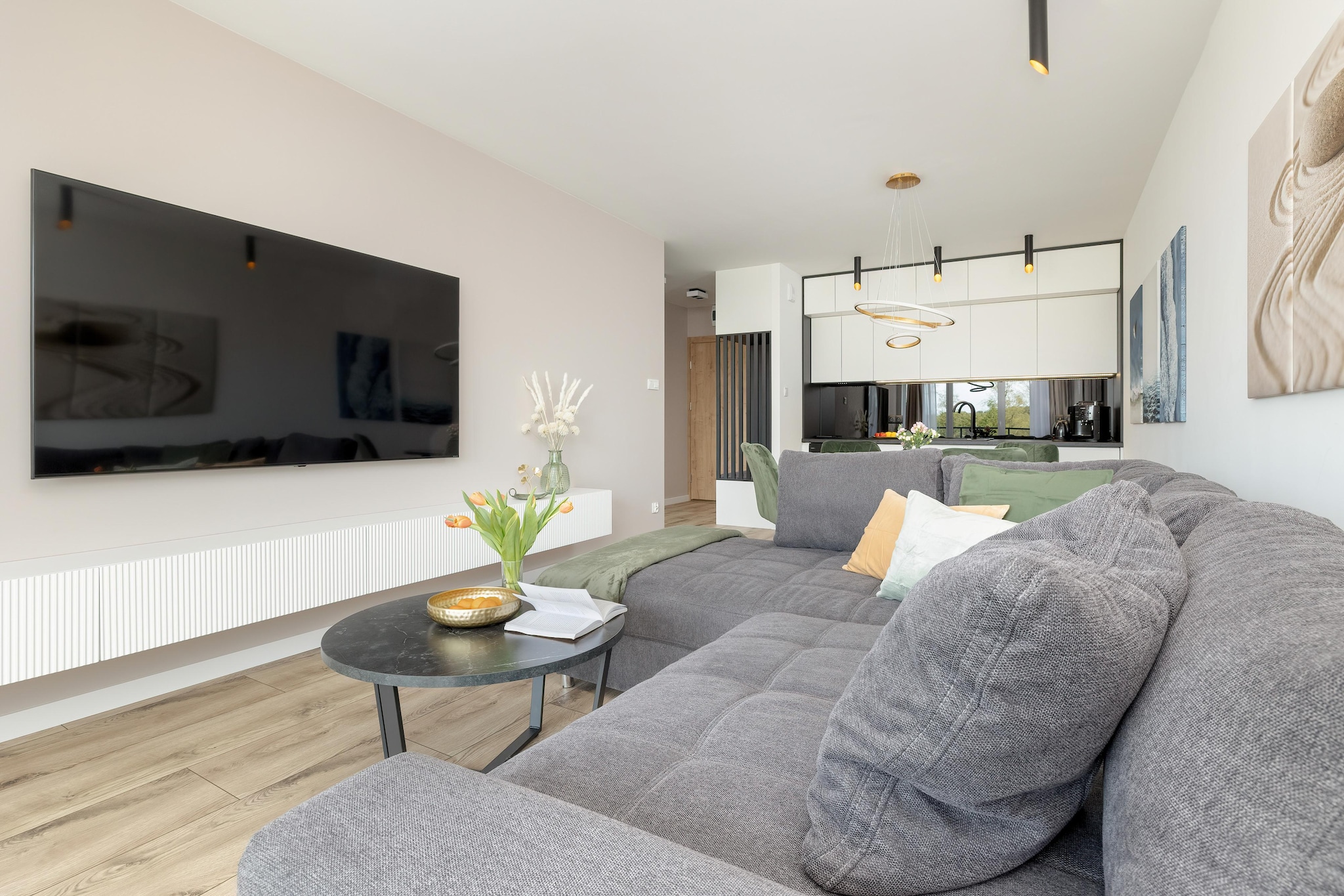 Ground floor: (open kitchen(hob(2 ring stoves, induction), electric kettle, hood, coffee machine, oven, dishwasher, fridge-freezer), Living/diningroom(double sofa bed, TV(flatscreen), dining table), bedroom(double bed, TV(flatscreen)), bathroom(shower, washbasin, toilet, washing machine))\n\nInternet access, Parking, Whirlpool, Massage, Fitness, Table tennis, Play area, Lawn, sauna(shared with other guests), balcony, heating(central), garden furniture, sun loungers, swimming pool(shared with other guests, heatable, indoor, including separate childrenâ€™s swimming pool (depth 50cm)), sand pit(shared with other guests), slide(shared with other guests), lift, ironing board, iron, Swing set