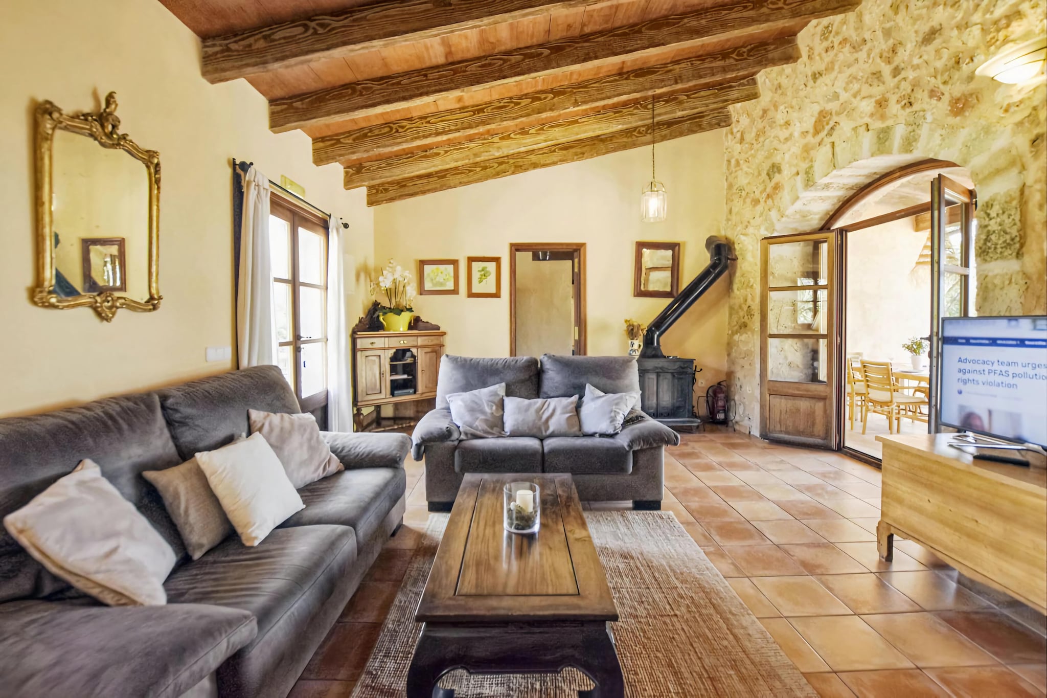 The finca with private pool is wonderfully situated in the middle of a Mallorcan winery on the outskirts of Santa Maria. The town of Santa MarÃa is located in the north of the capital, Palma de Mallorca, and is a starting point, ideal for all directions of the island, since from the farm there is a nearby motorway connection.  
The family of the owners produces their own wine on this huge 26-hectare estate, so you can enjoy a guided tour and tasting while spending your vacation here. The nearest supermarkets in Santa MarÃa or Marratxi are just a few minutes by car. For more in-depth shopping, you can reach the capital Palma in a few minutes (15 km). For those looking for special offers or simply want to spend a fun afternoon with the family, we recommend the Mallorca Fashion Outlet shopping center, just 6 km.  
The house has a spacious living room,  a total of 4 double rooms, three bathrooms (two en-suite), all with their own air conditioning Living room with satellite TV, WiFi Internet and kitchenette with dishwasher. From the living room you can access the covered terrace and the magical garden, which looks like a small forest and, therefore, it offers a lot of shade. Here, a few steps down, is the large private 10-foot saltwater pool, a dream place to quickly forget the stress of everyday life. There is a mobile barbecue and there are sufficient parking spaces in front of the house. 
BY THE WAY: This property can be perfectly combined with another estate (up to 8 additional guests) on the same property just a few hundred meters from distance.