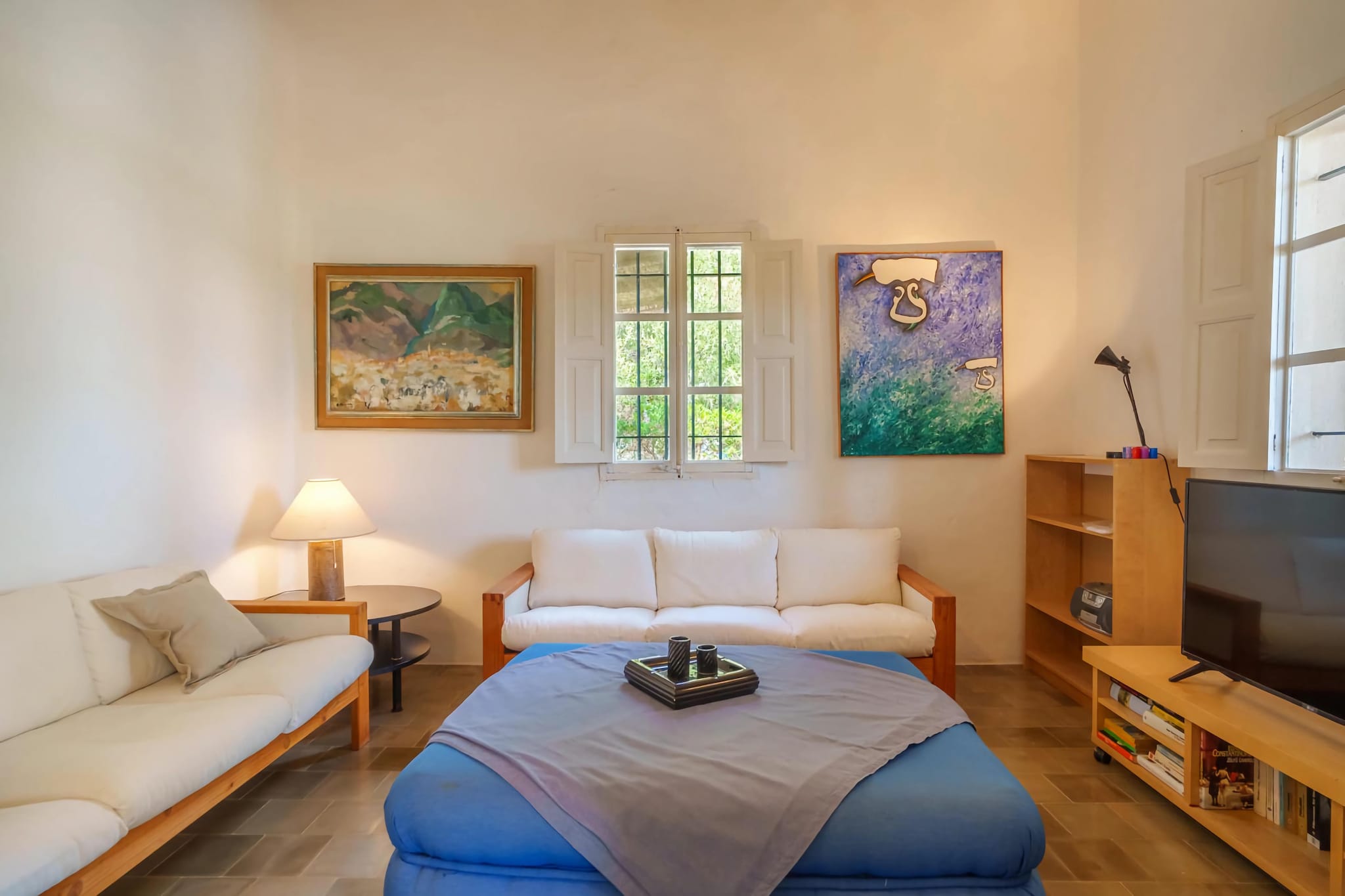 Set in the serene Mal Pas area, this traditional Mallorcan villa offers sweeping views of the sea and the picturesque Marina de Bonaire. Surrounded by lush forest, it provides a unique sense of seclusion despite being just 300 meters from the beaches of Sant Joan and Sant Pere. The villa's expansive terrace is perfect for lounging in the sun during the day or enjoying outdoor meals under the stars, all while taking in the peaceful coastal surroundings.

This spacious and charming villa captures authentic Majorcan character with its warm design and unbeatable location. Whether youâ€™re waking to the sound of waves or strolling to the nearby Crocodile Restaurant or the relaxed â€œ5 Oceansâ€ bar, everything you need is within walking distance. Thereâ€™s also a small supermarket at the marina, offering convenient access to essentials during your stay.

The outdoor area is a true highlight, featuring a panoramic view of the shimmering saltwater pool and the turquoise sea beyond. A large terrace with sun loungers invites you to unwind, while a covered section includes comfortable seating and a dining tableâ€”perfect for alfresco meals or simply soaking in the breeze. This villa is an ideal choice for those seeking tranquility with easy access to the best of Alcudiaâ€™s coastline.