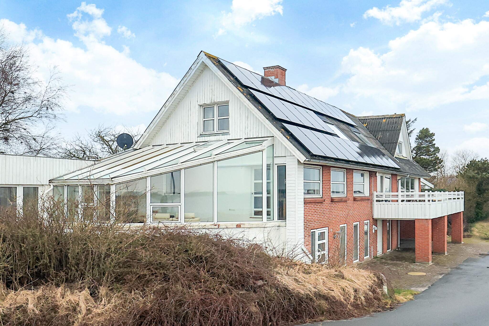 Kitchen(cooker(2 ring stoves), oven, microwave, dishwasher, fridge-freezer), Living/bed room(TV(german television channels, danish TV channels (DR1 and TV2))), bedroom(double bed), bedroom(double bed), bedroom(double bed), bedroom(double bed, 2x bunk bed), bedroom(double bed, 2x bunk bed), bathroom(washbasin, shower, toilet), bathroom(washbasin, shower, toilet), bathroom(washbasin, toilet), fridge-freezer, tumble dryer, Bubble bath(indoor, 4 persons), sauna(indoor), washing machine, balcony, heating(central), garden furniture, swimming pool(indoor, 180 m2), table tennis table, table football, darts, billiards, children\'s bed, high chair