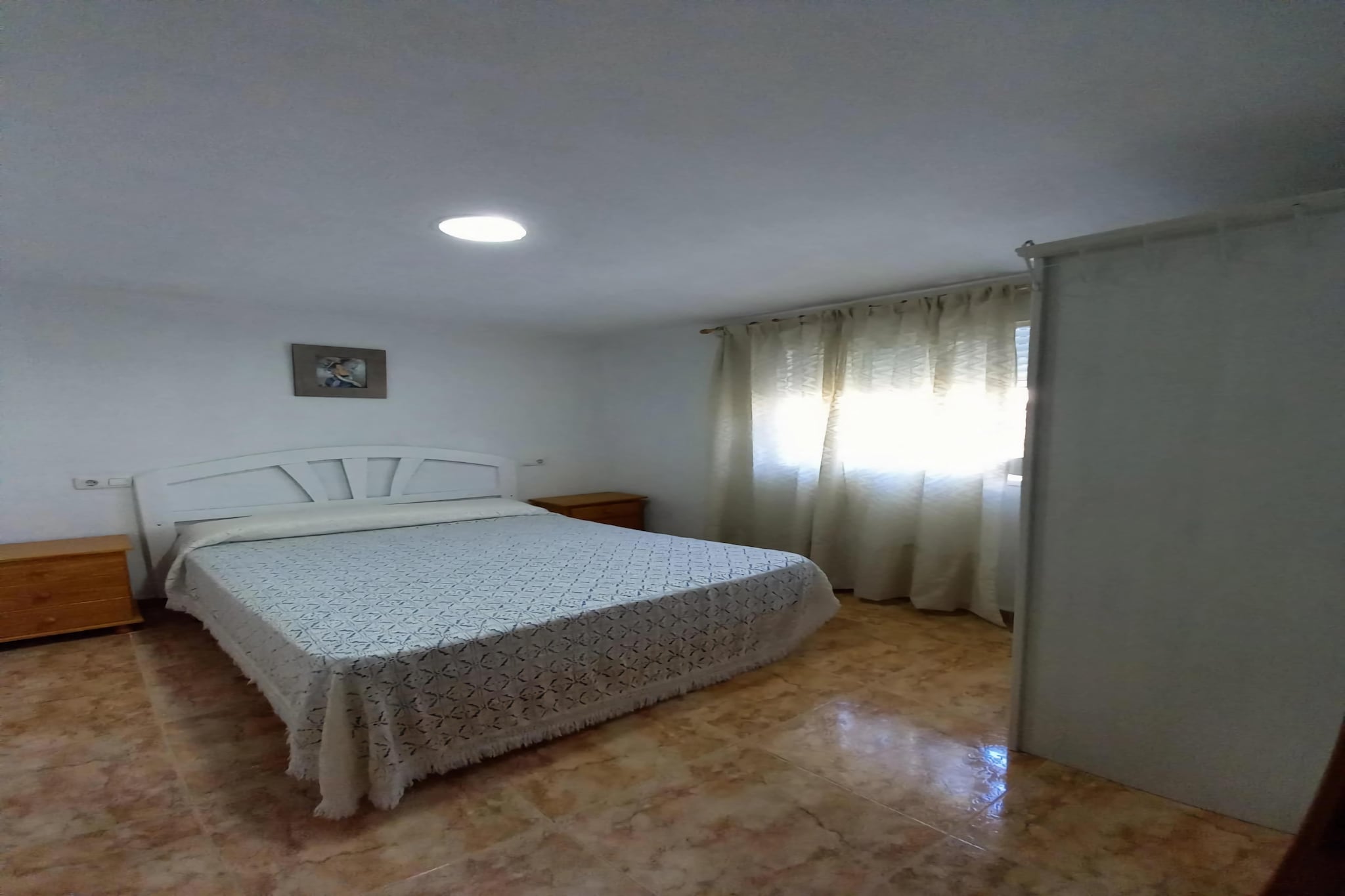 On the 1st floor: (Living room(TV, dining table, seating area, air conditioning), Kitchen(toaster, cooker, coffee machine, oven, microwave, fridge-freezer), bedroom(double bed), bedroom(single bed, single bed), bedroom(single bed, single bed), bathroom(bathtub or shower, washbasin, toilet, bidet), washing room(washing machine))\n\ngarden