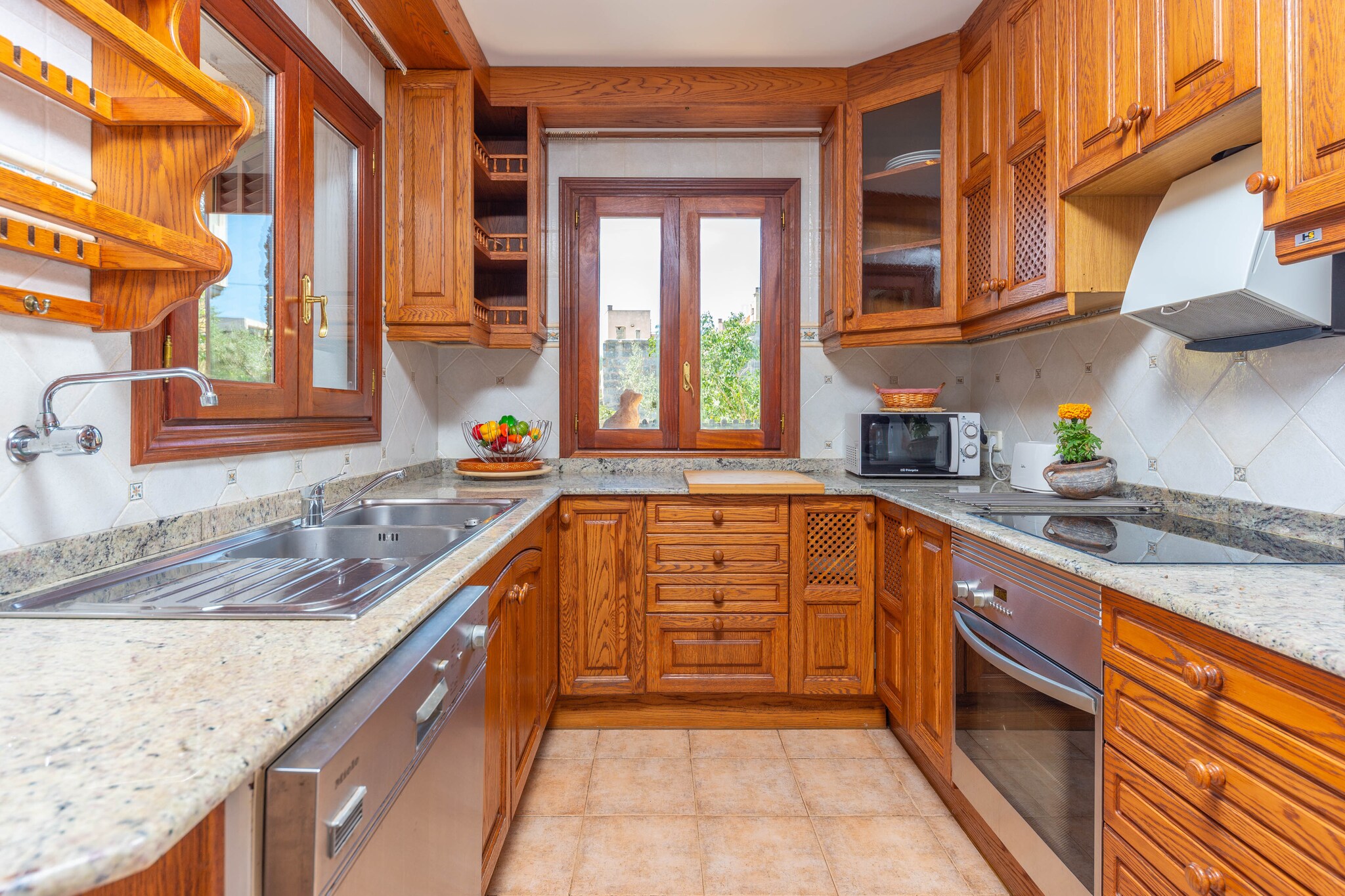 Living room, Living room, Kitchen(cooker, coffee machine), bedroom(2x single bed), bedroom(double bed), bedroom(double bed), bathroom, bathroom, oven, microwave, dishwasher, fridge-freezer, bath tub, bath tub, washbasin, washbasin, toilet, toilet, bidet, bidet, balcony or terrace, air conditioning, air conditioning, air conditioning, garden, garden furniture, 6x sun loungers, BBQ, swimming pool, children\'s bed, high chair